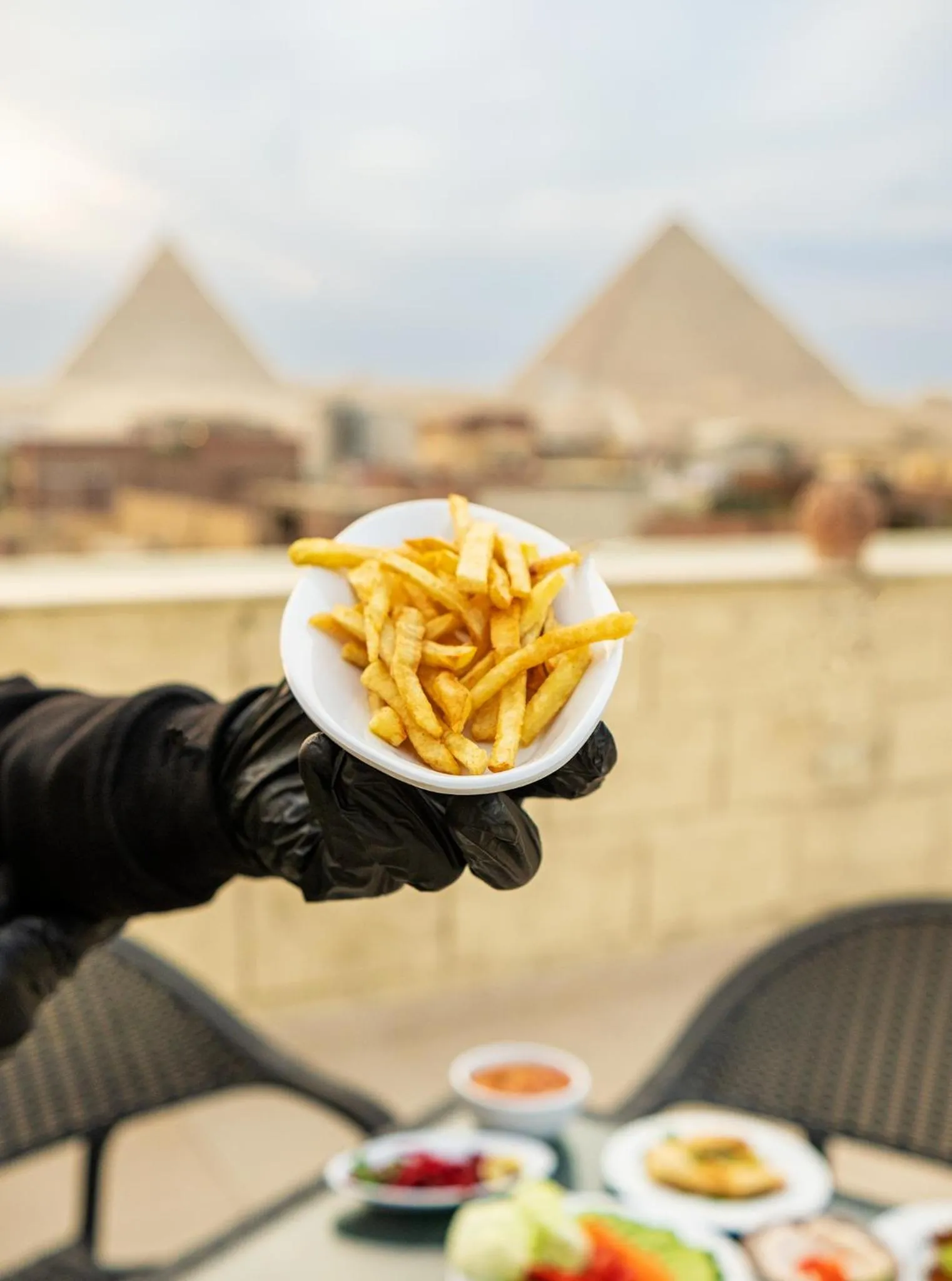 Restaurant/places to eat in Hassan Pyramids Hotel & free access Rooftop & airport pickup