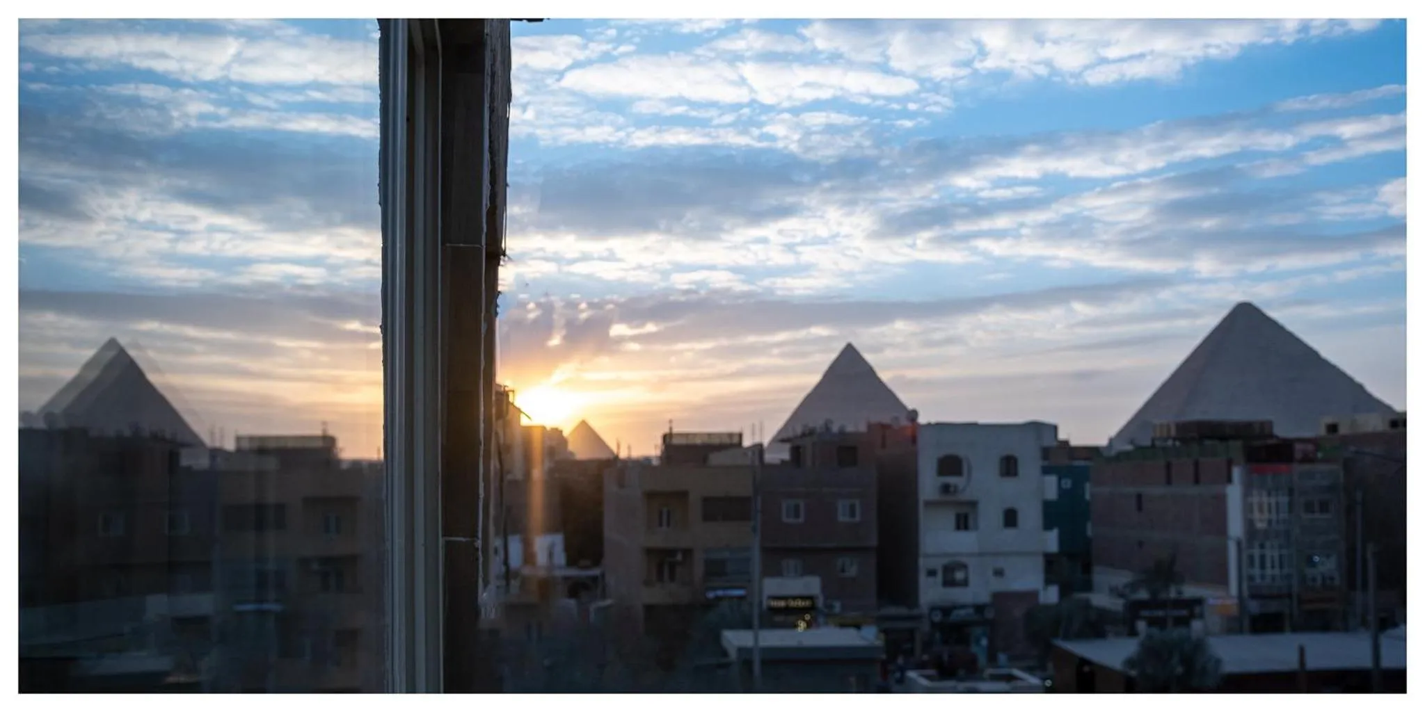 Day in Hassan Pyramids Hotel & free access Rooftop & airport pickup