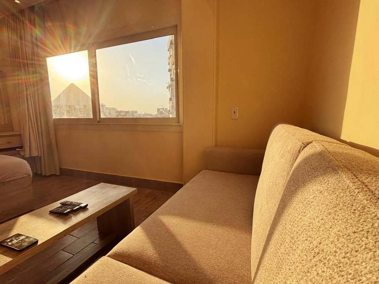 Seating area in Hassan Pyramids Hotel & free access Rooftop & airport pickup