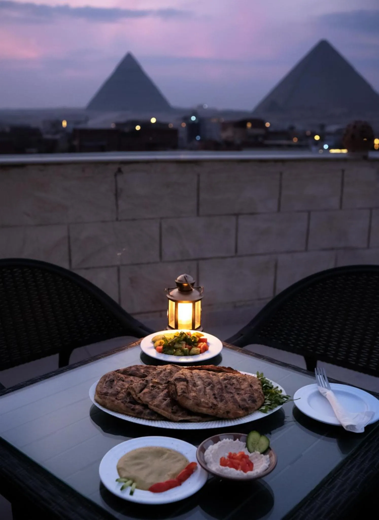 Restaurant/places to eat in Hassan Pyramids Hotel & free access Rooftop & airport pickup