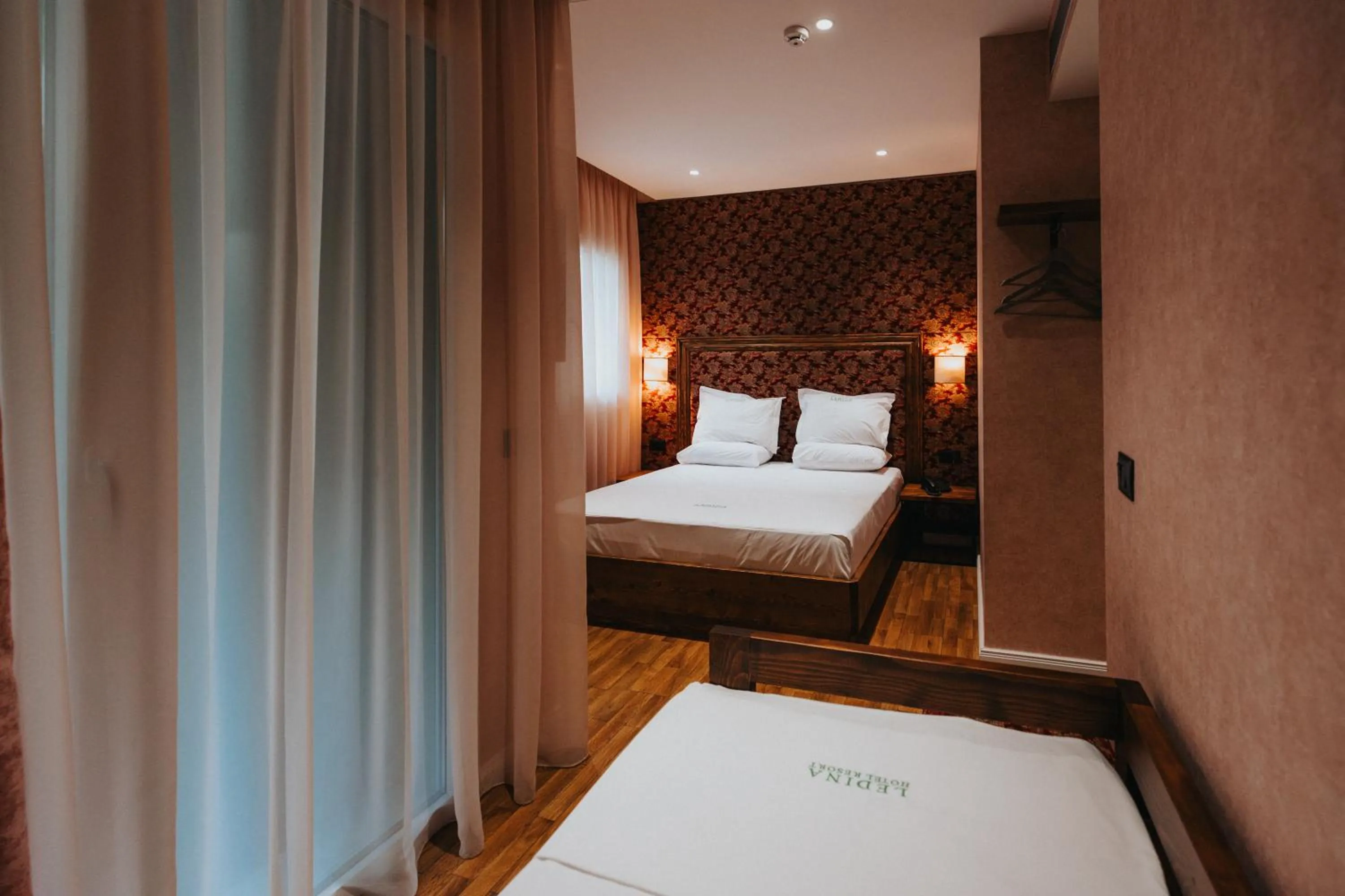 Bed in Ledina Hotel