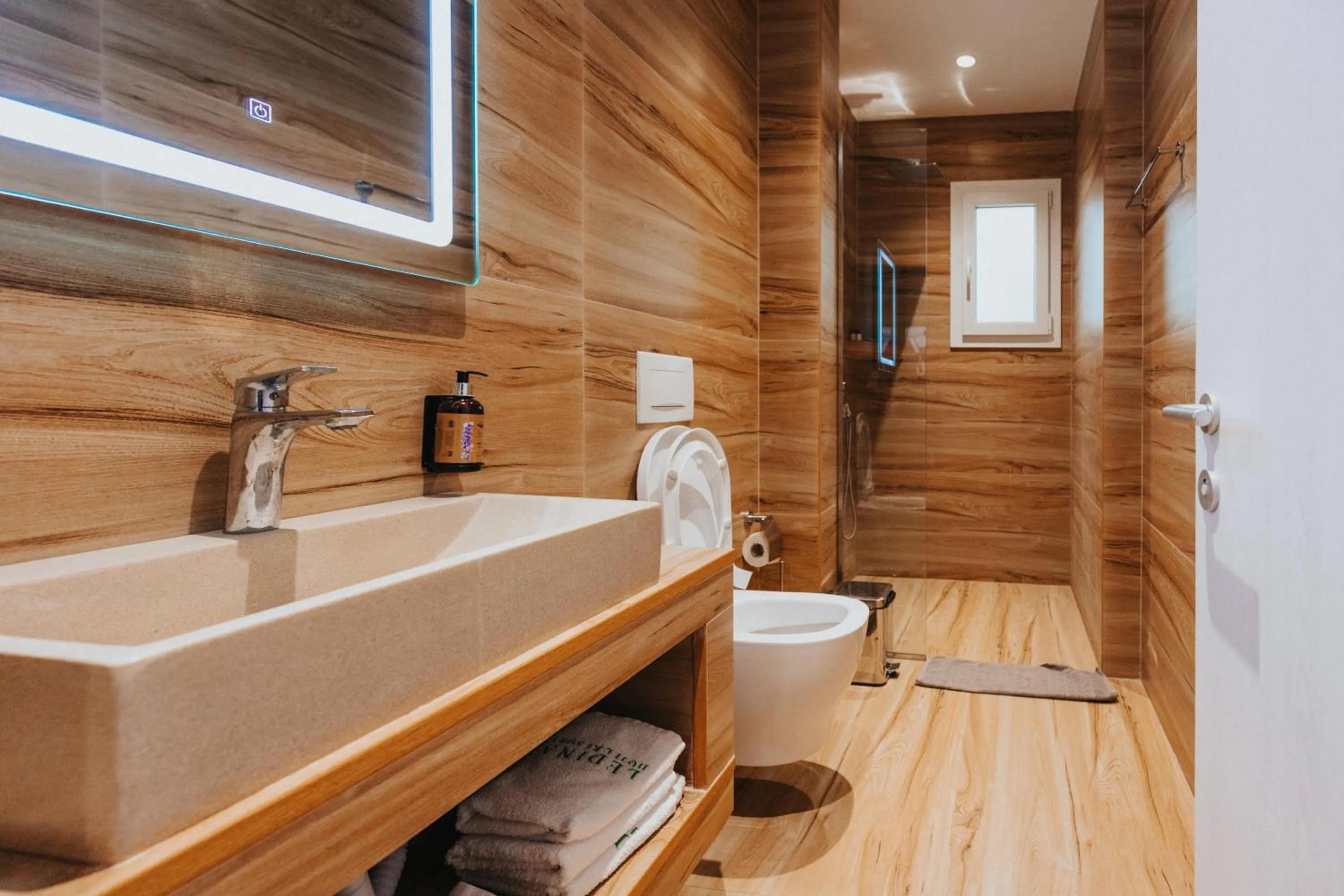 Bathroom in Ledina Hotel