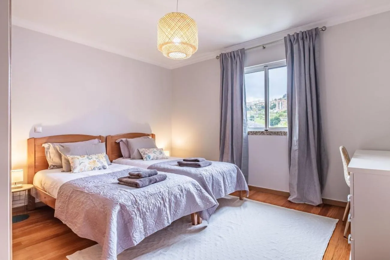 Bed in Caniço Penthouse by Homie