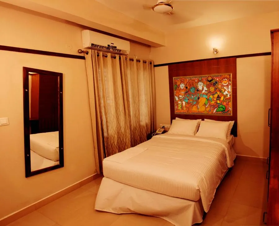 Photo of the whole room, Bed in Srivar Hotels