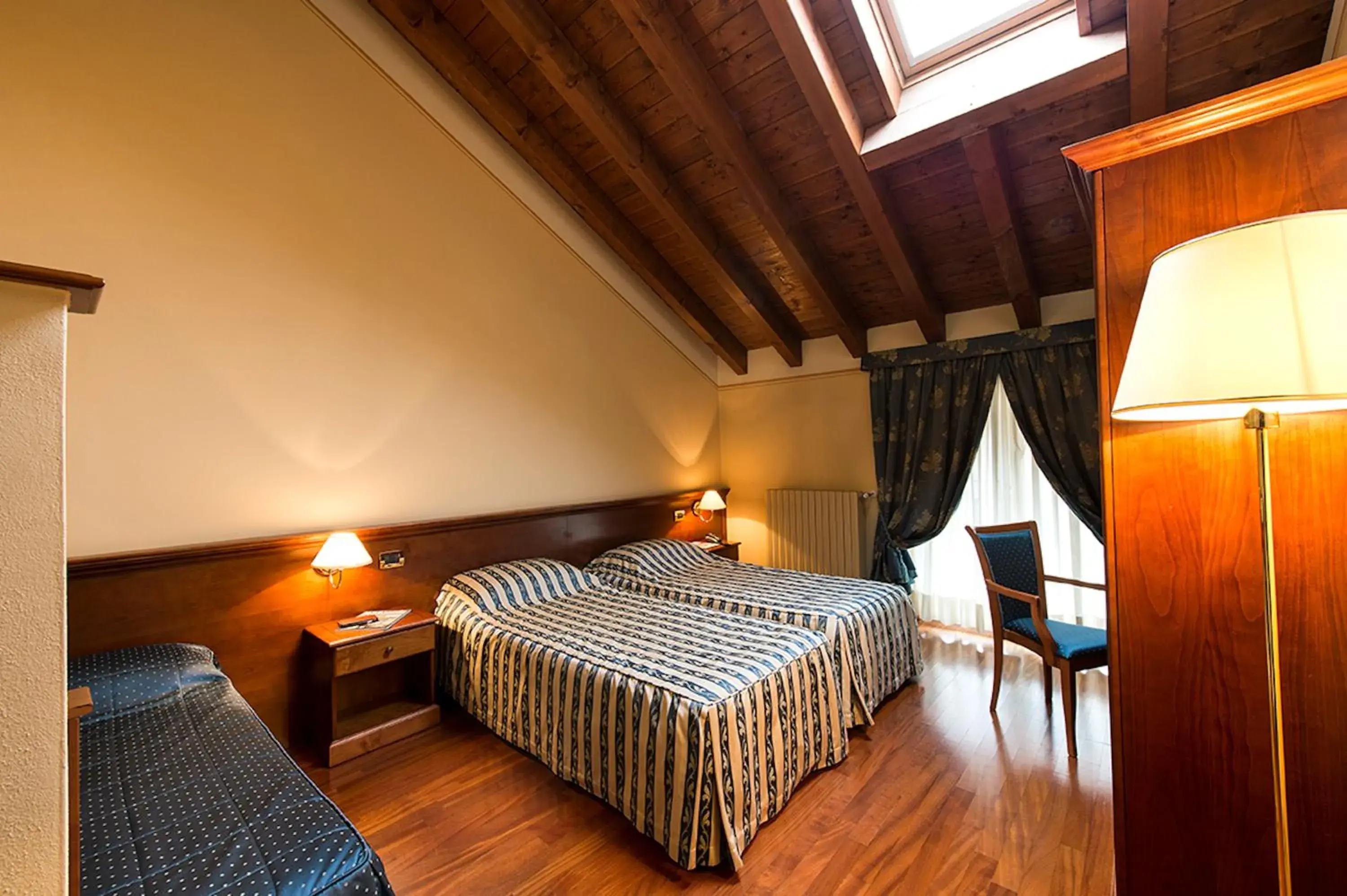 Photo of the whole room, Bed in Centro Paolo VI Photo of the whole room, Bed in Centro Paolo VI