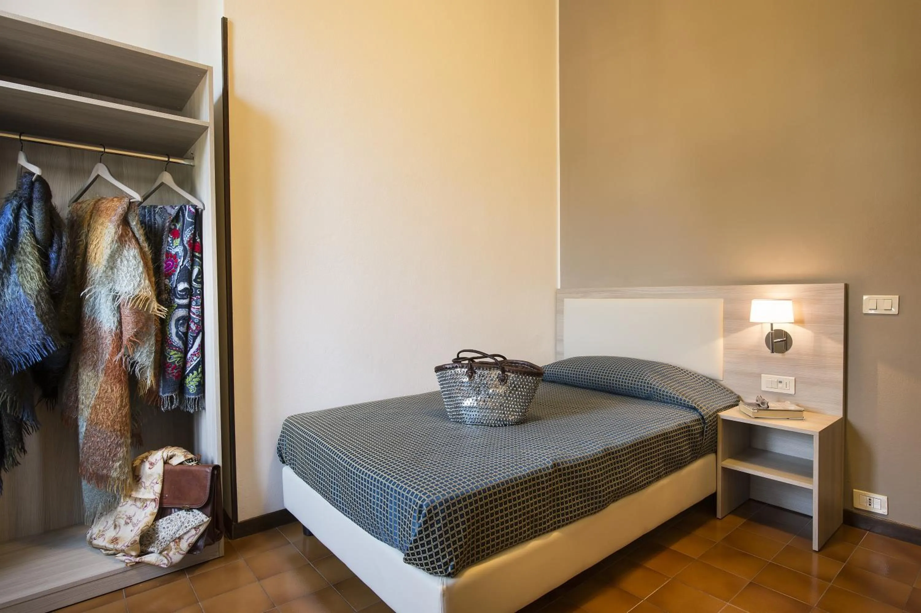 Photo of the whole room, Bed in Centro Paolo VI