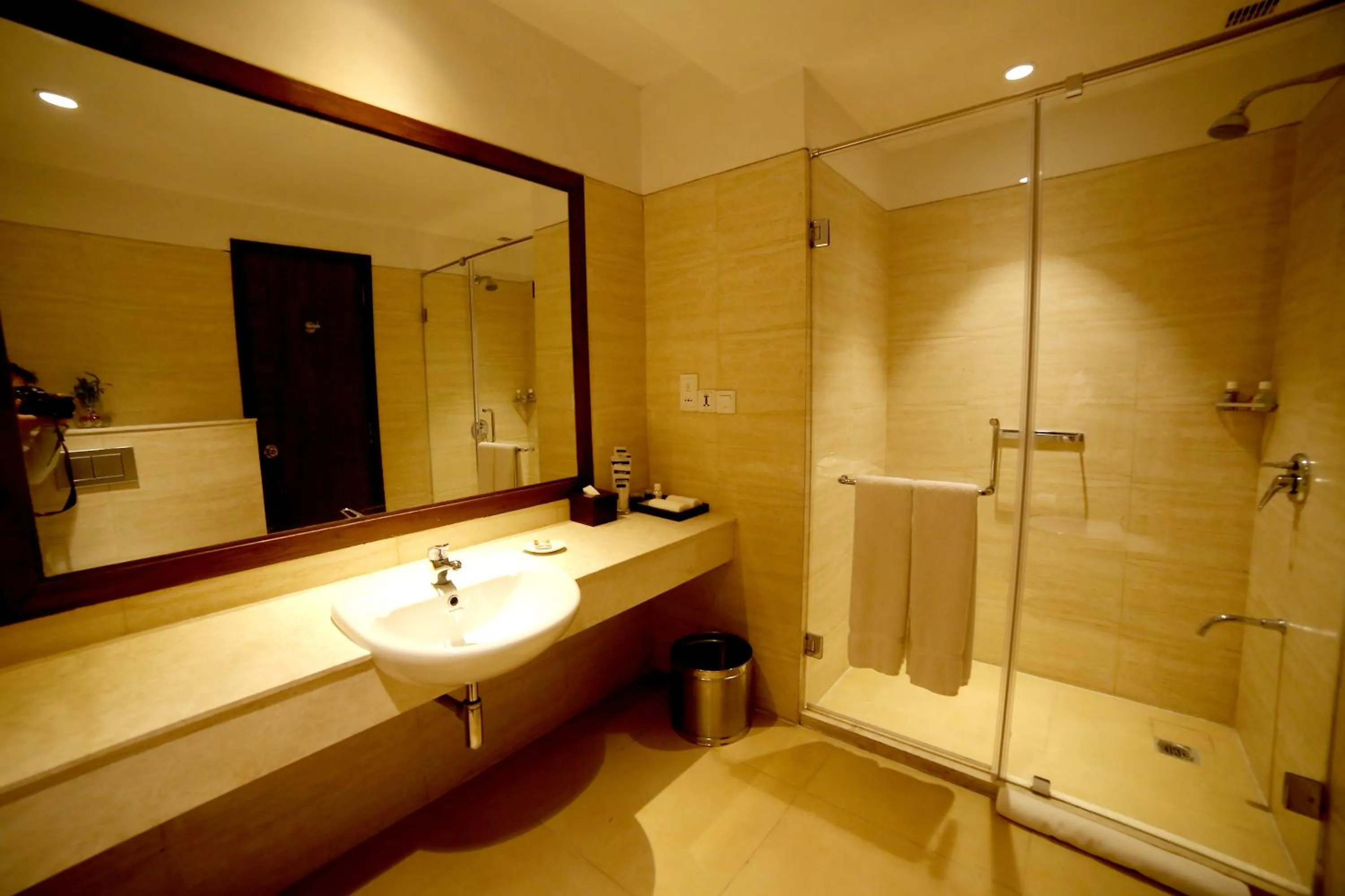 Shower in The Lalit Traveller- Airport hotel
