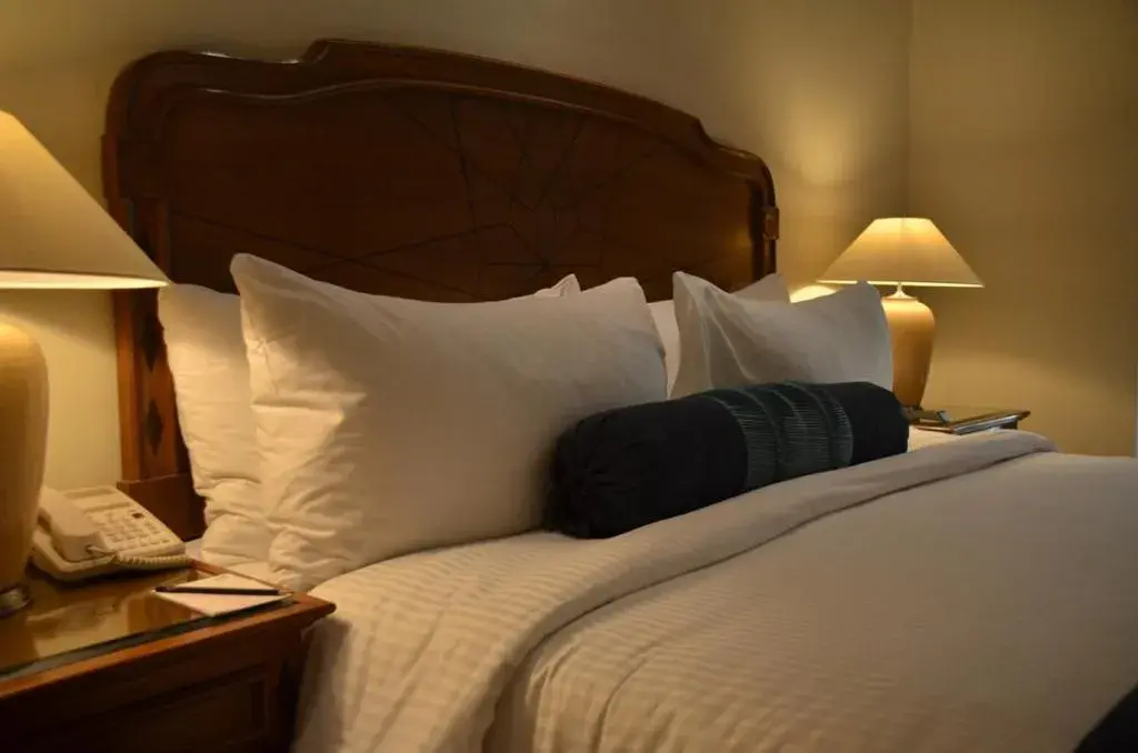 Bed in The Lalit Traveller- Airport hotel Bed in The Lalit Traveller- Airport hotel