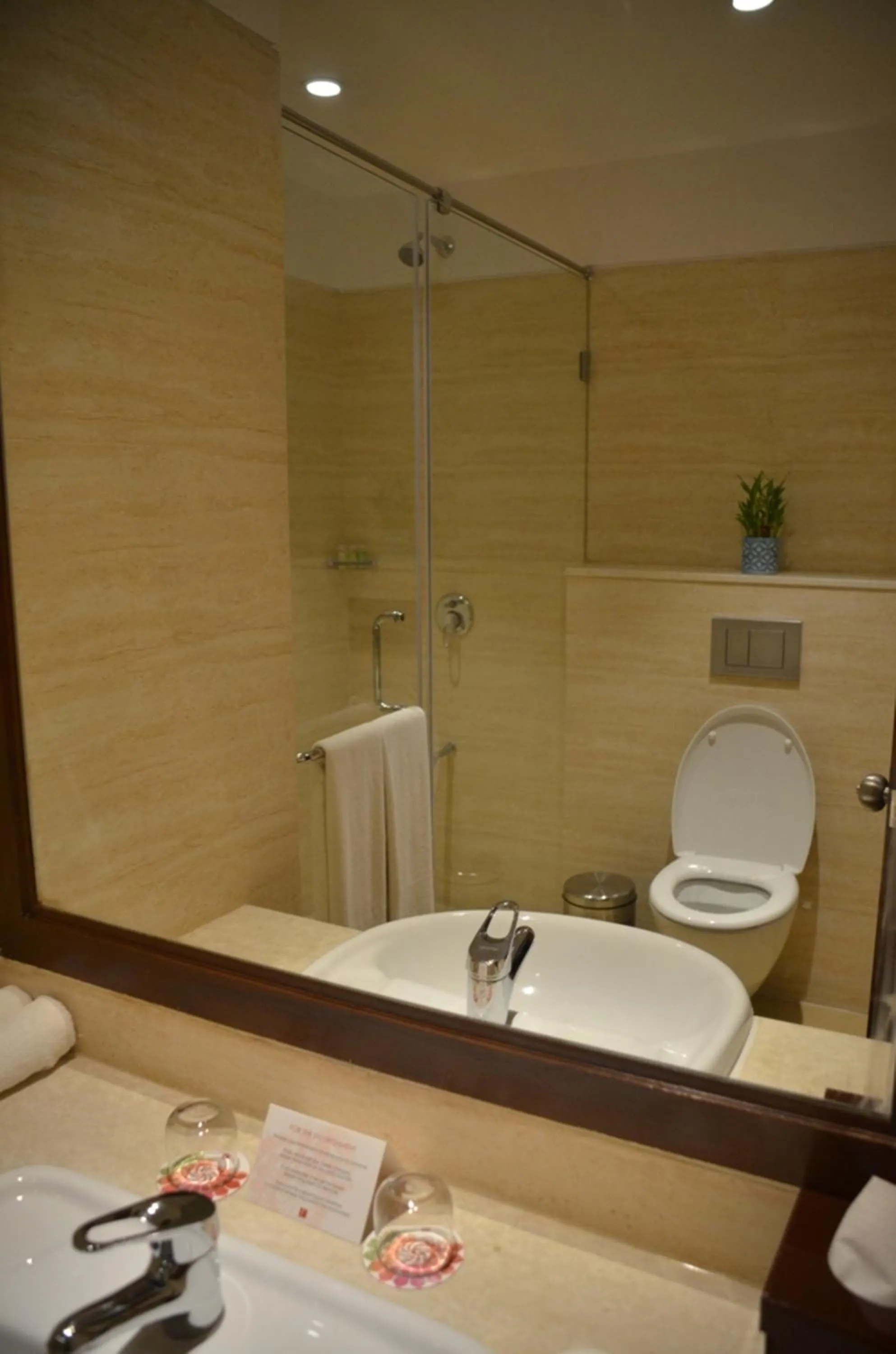 Bathroom in The Lalit Traveller- Airport hotel