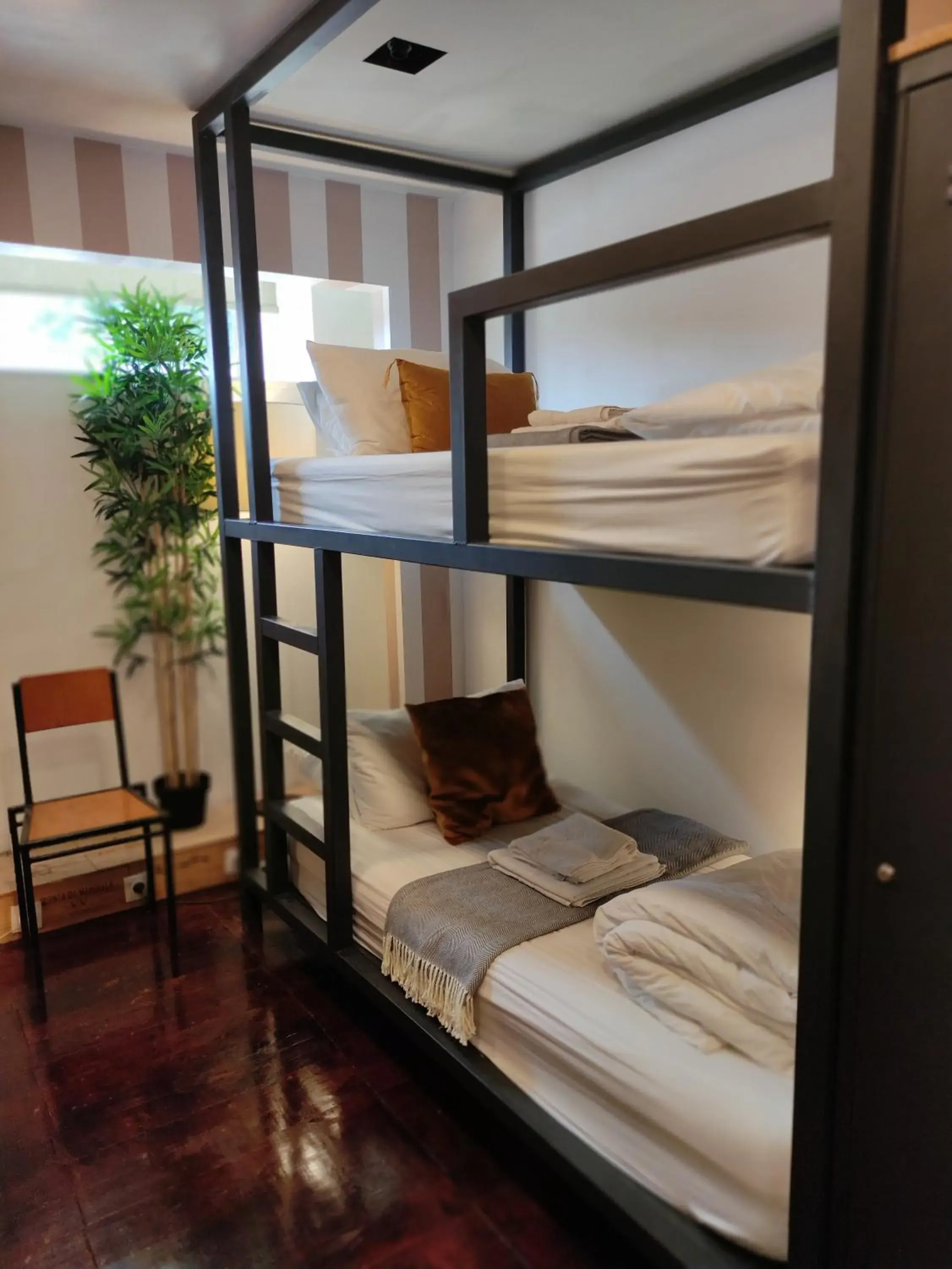 Bed in 4-Bed Mixed Dormitory Room in Caruma Surf Hostel Bed in 4-Bed Mixed Dormitory Room in Caruma Surf Hostel