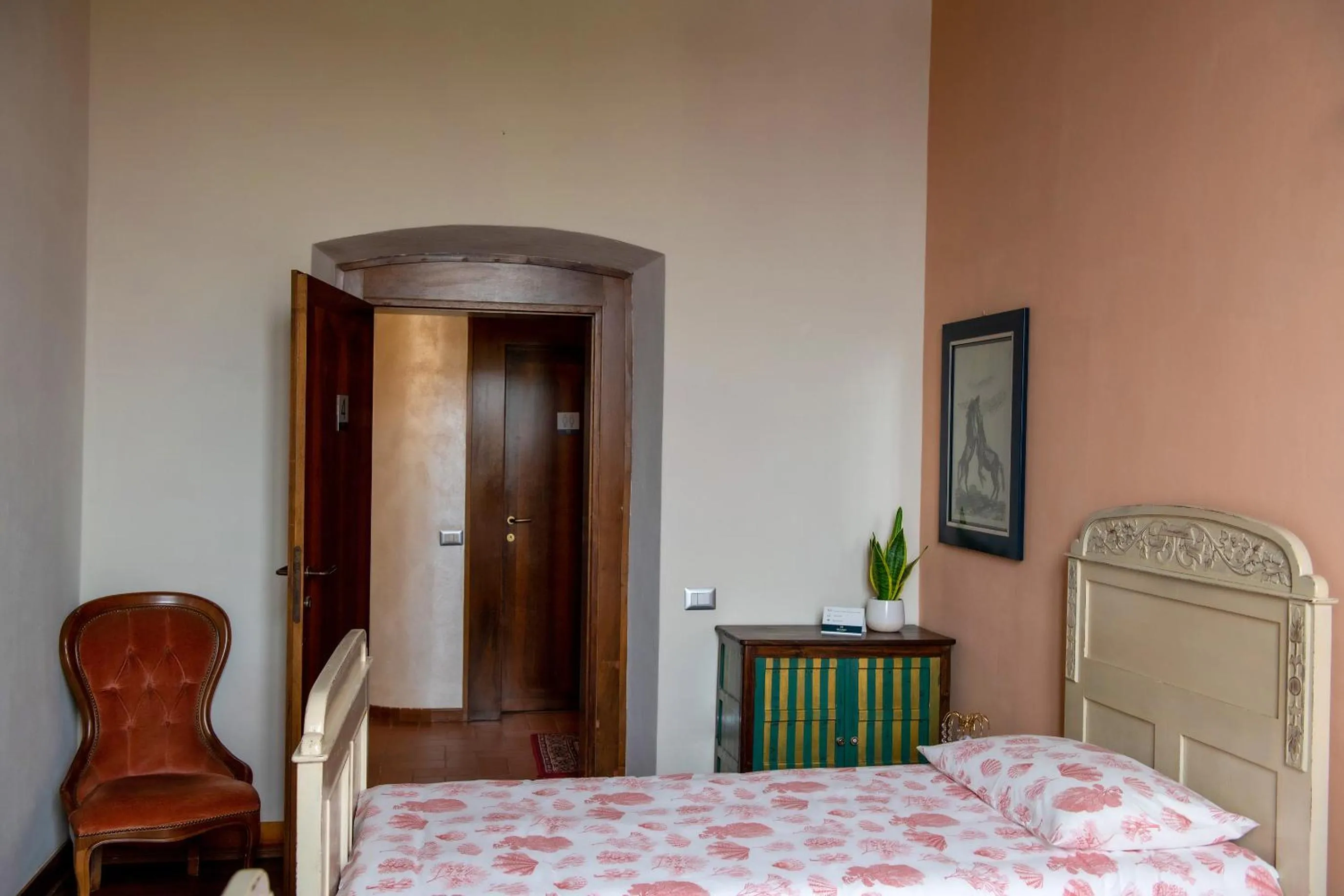 Bed in PALAZZO Bed and Breakfast