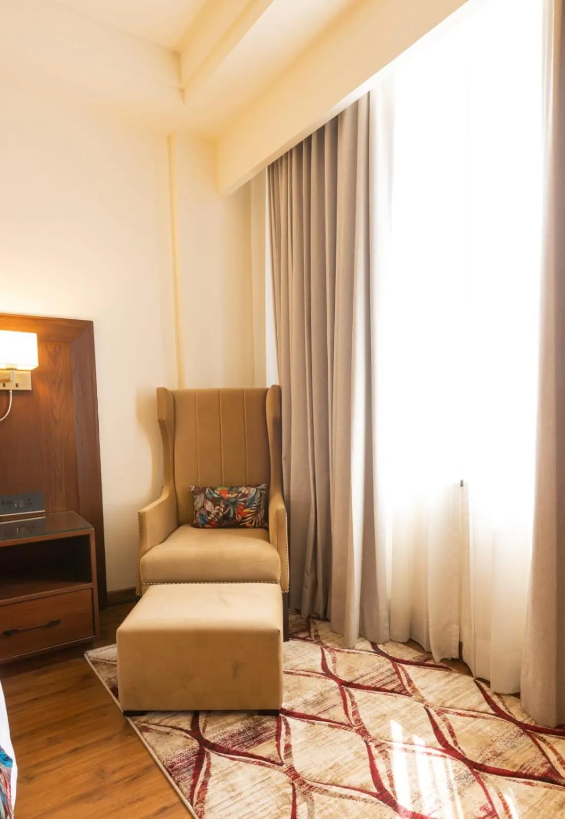 Seating area, Bed in Clarks Inn Express Ludhiana