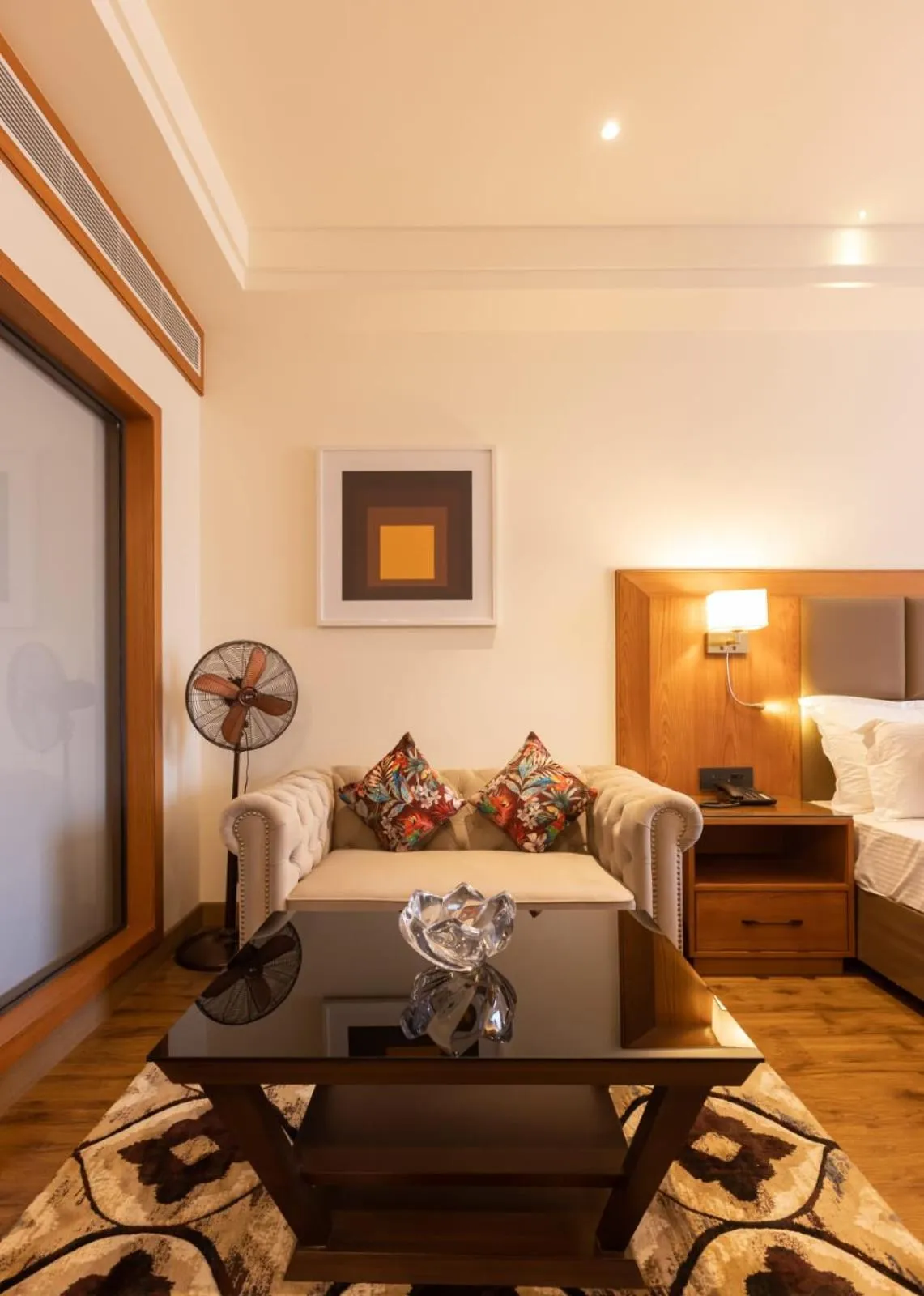 Seating area, Bed in Clarks Inn Express Ludhiana