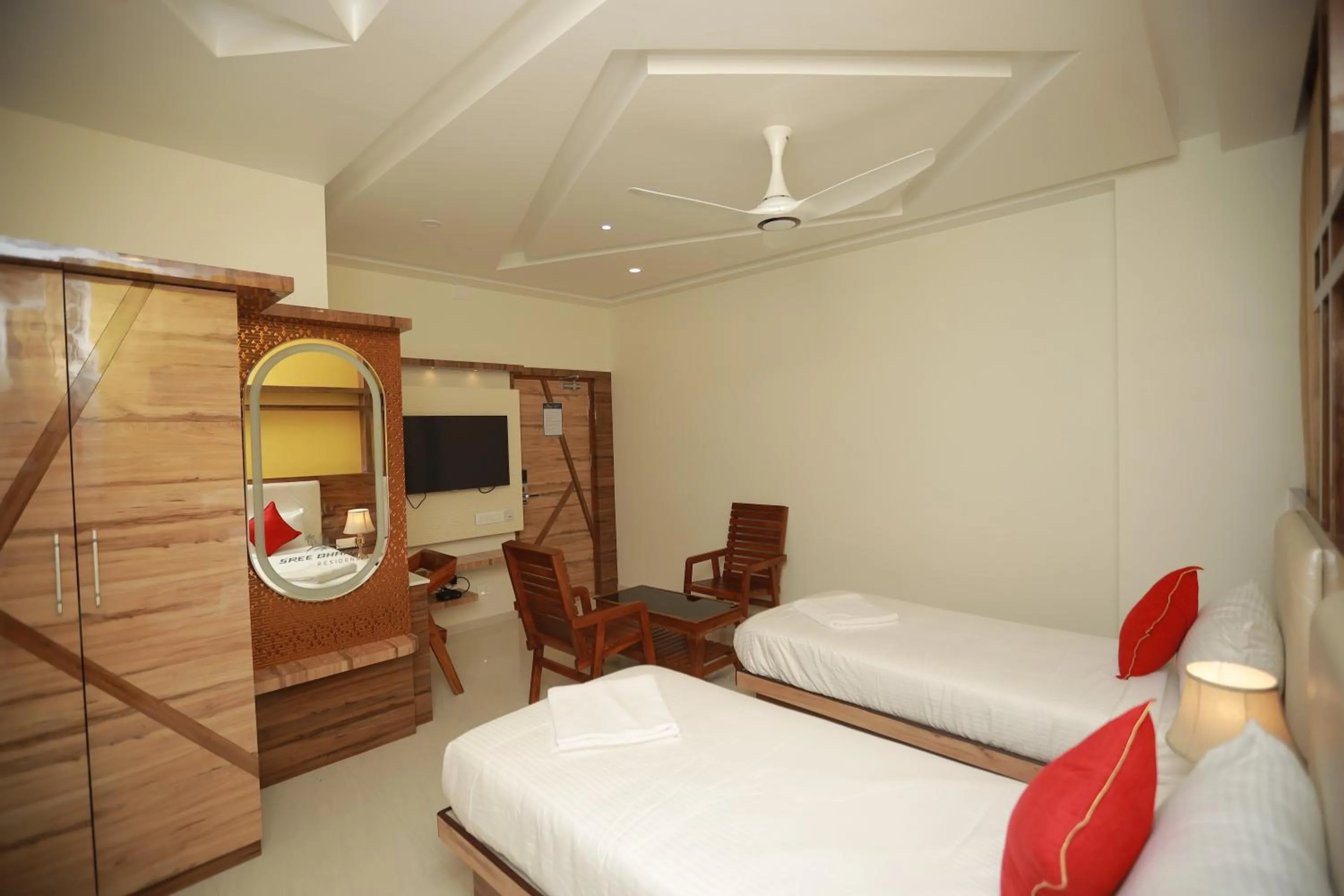 Photo of the whole room, Bed in Sree Bharat Residency