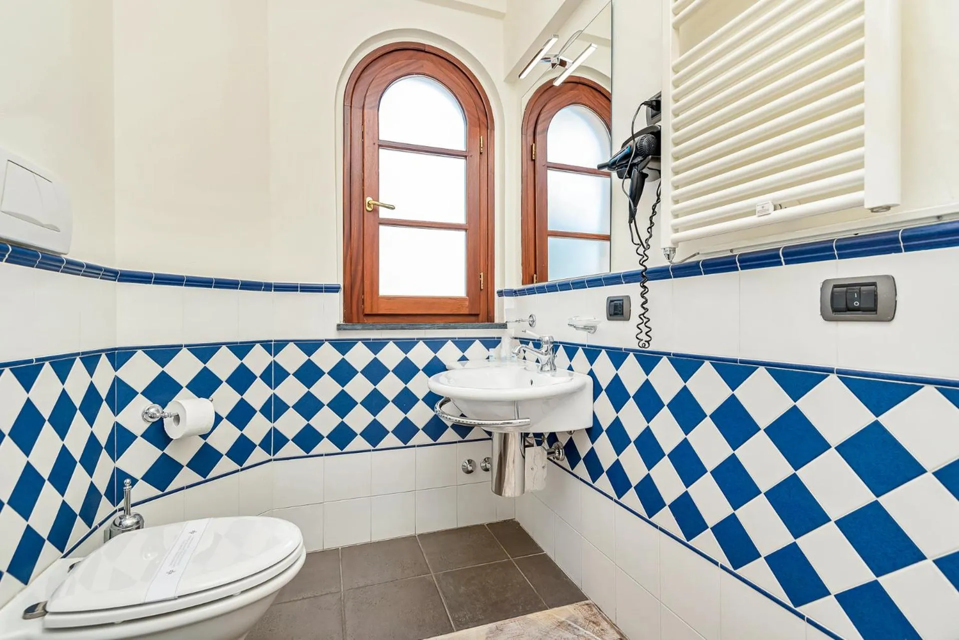 Toilet in Hotel la Pietra restaurant
