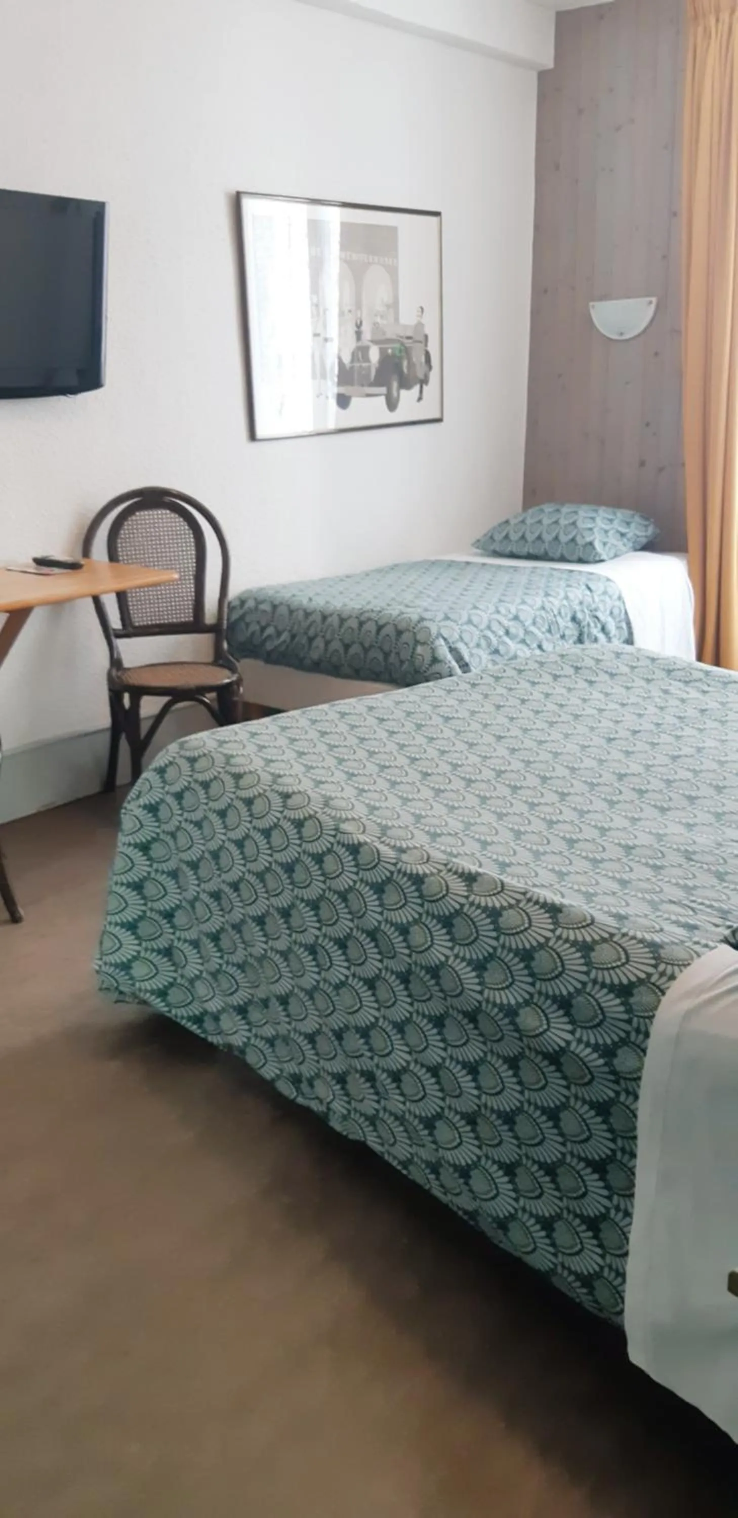 Photo of the whole room, Bed in Hôtel de la Grotte