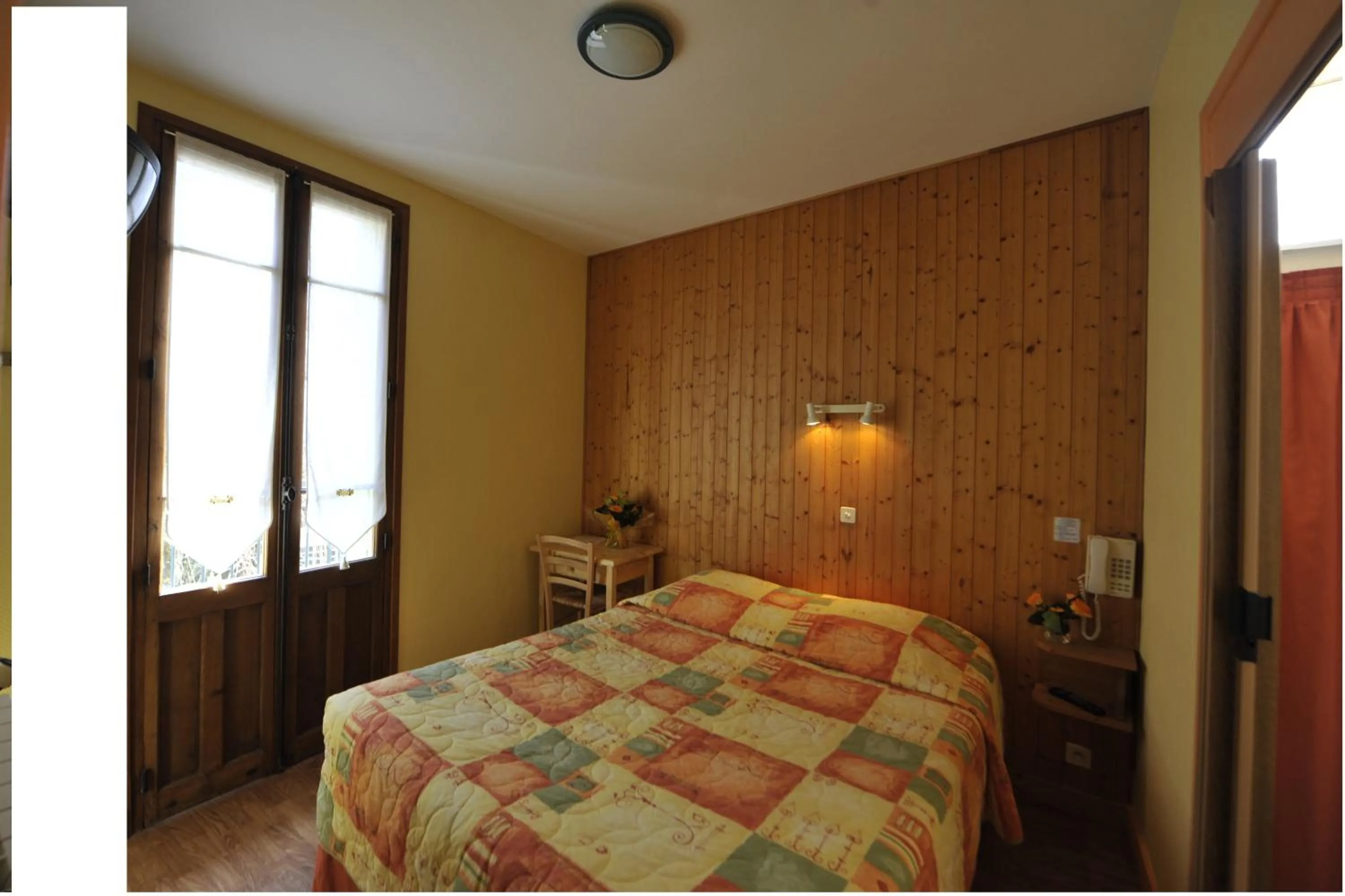 Photo of the whole room, Bed in Hôtel de la Grotte