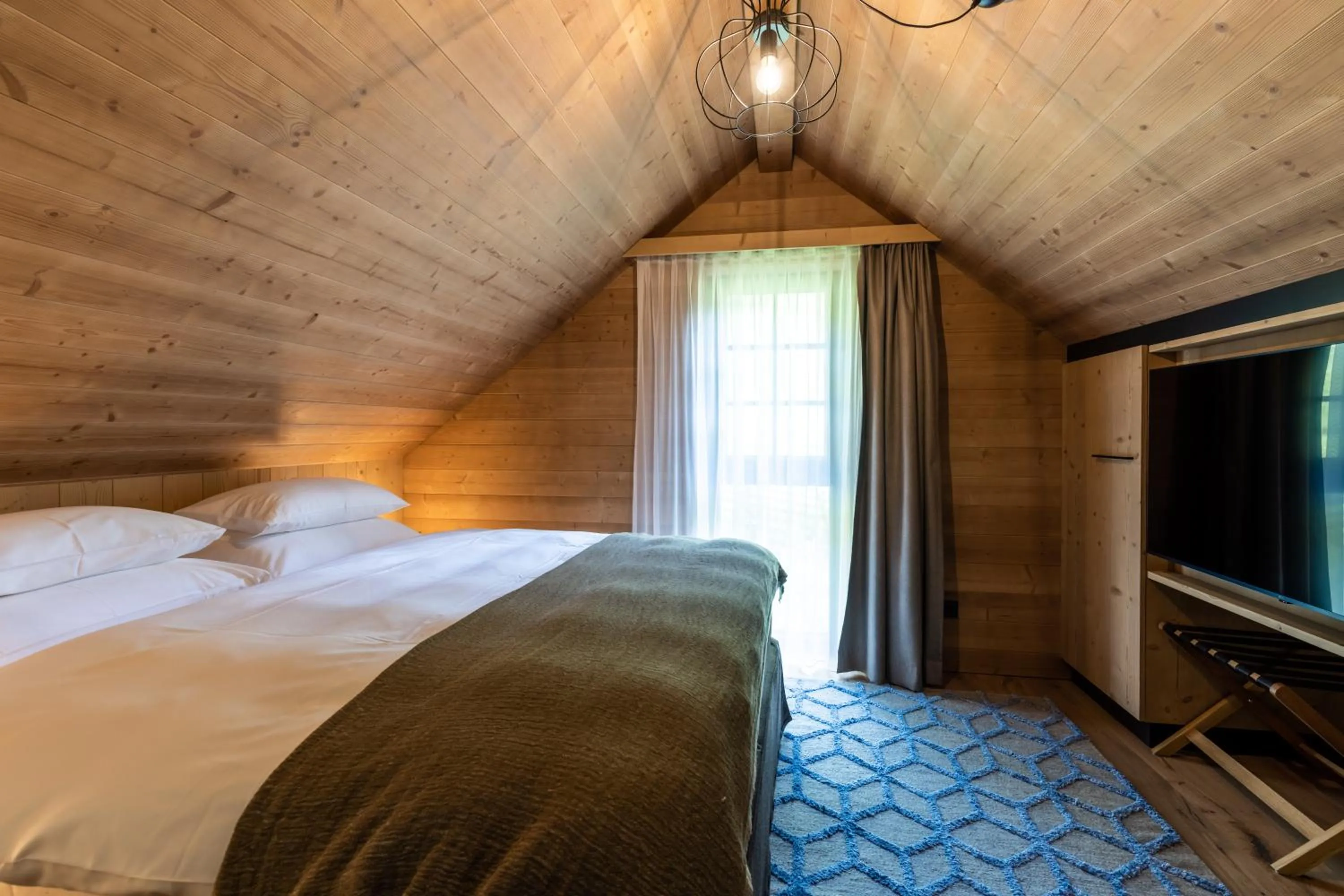 Bedroom, Bed in Hideaway Hotel Montestyria Chalets & Suiten