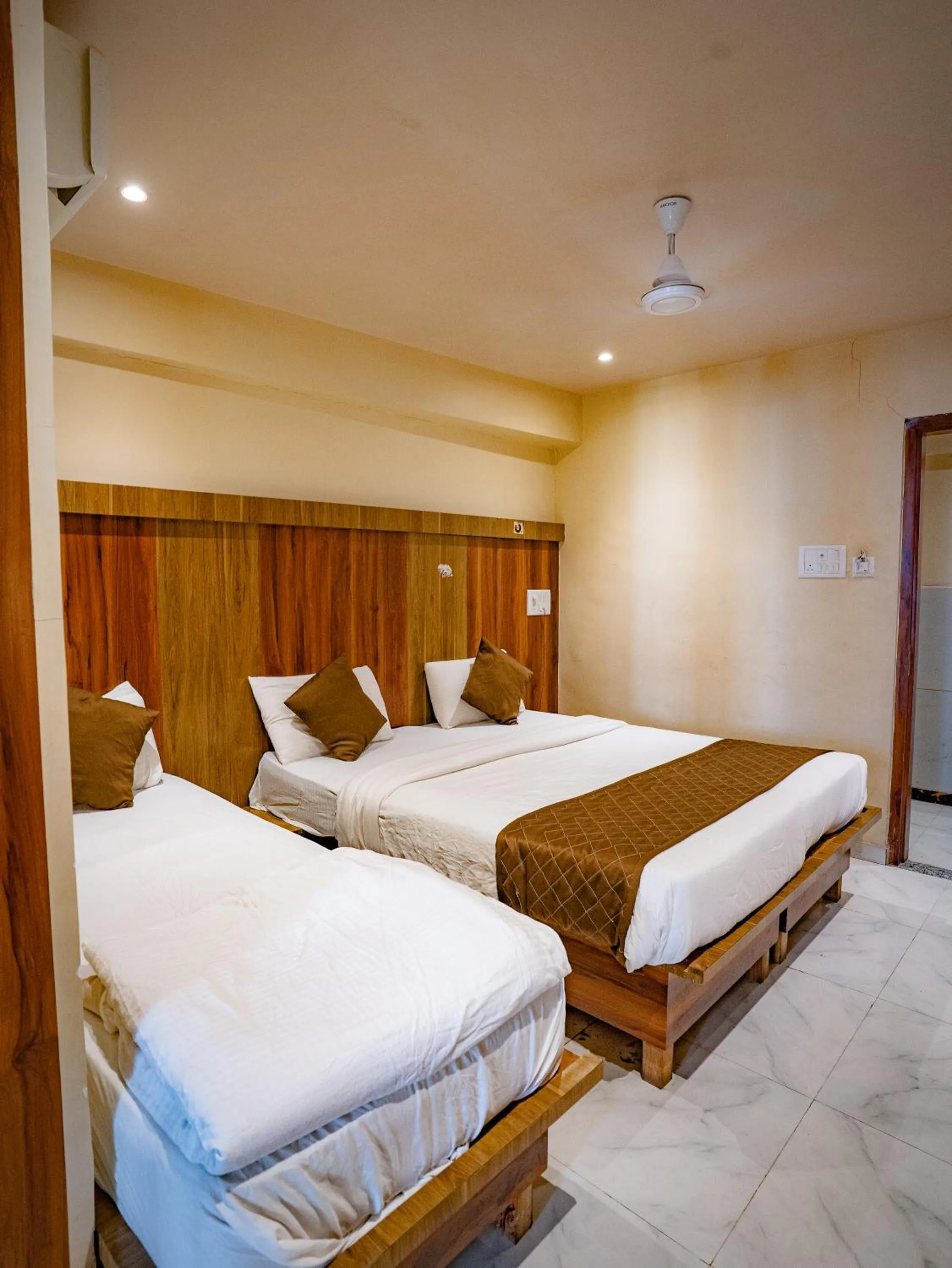 Bed in Hotel Mourya Residency