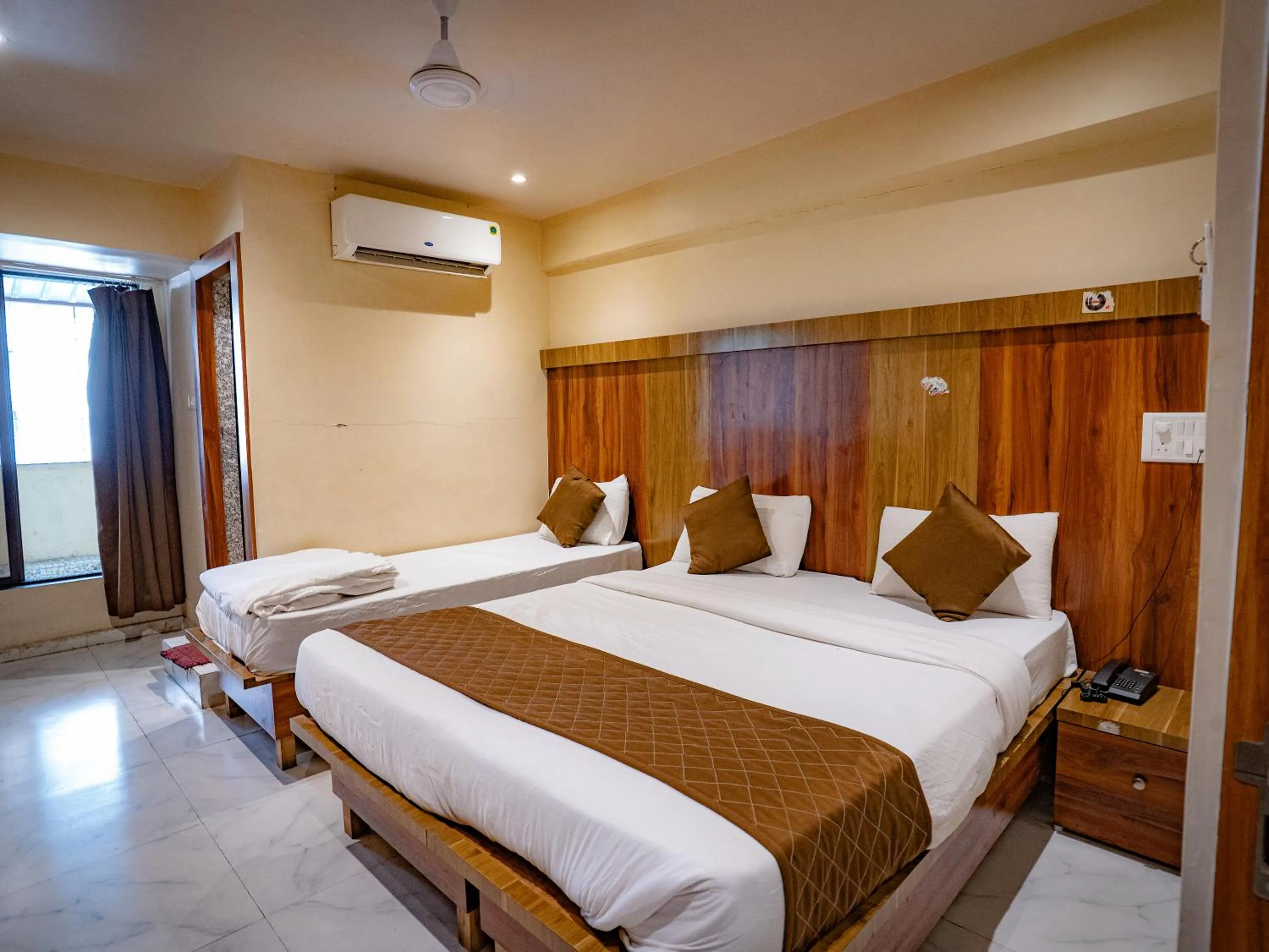 Bed in Hotel Mourya Residency