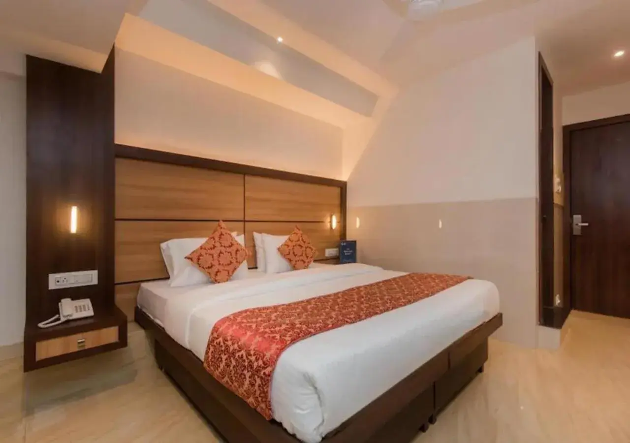 Bedroom, Bed in Hotel Mourya Residency Bedroom, Bed in Hotel Mourya Residency