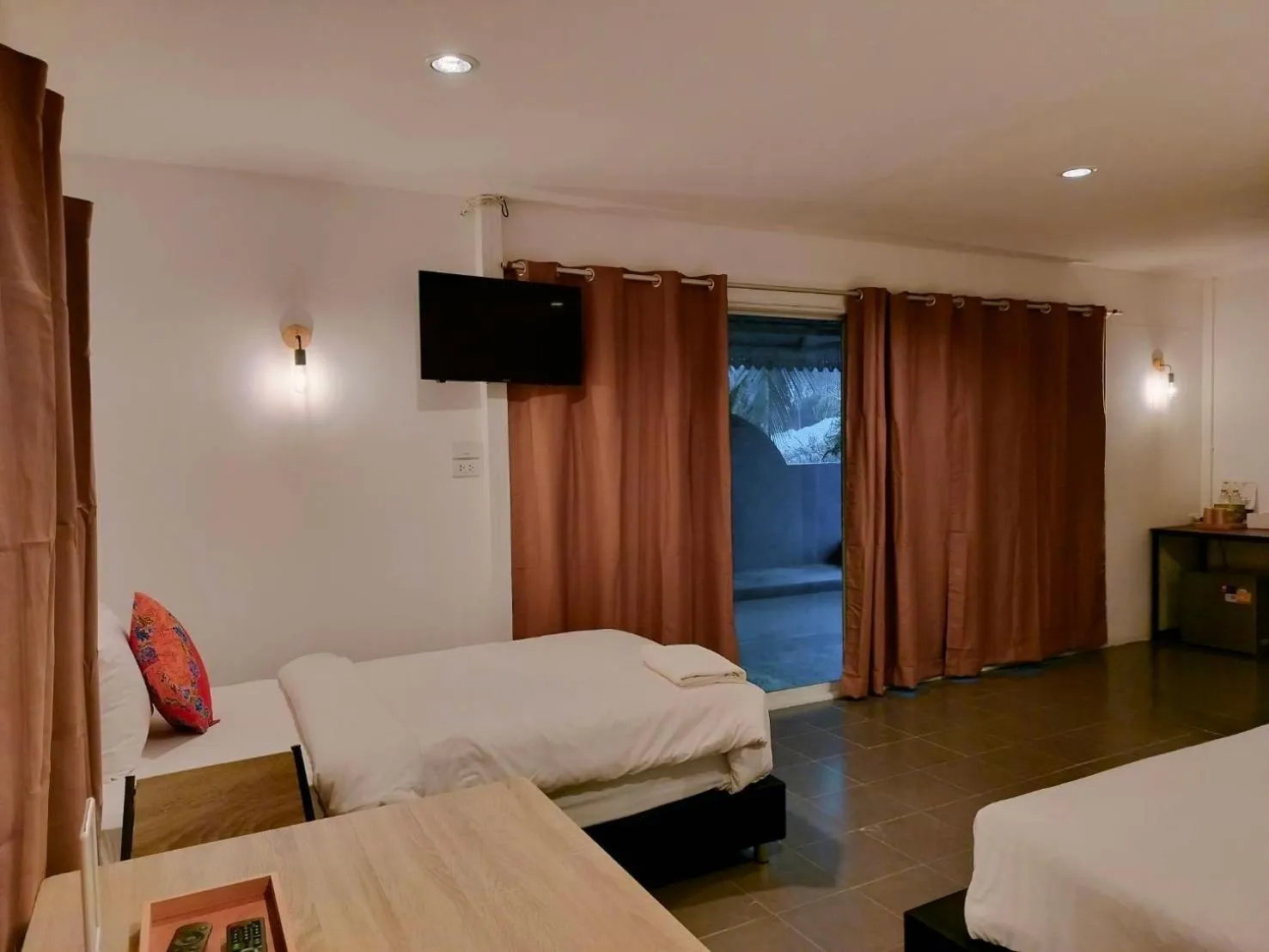 Bed in THANSILA Resort