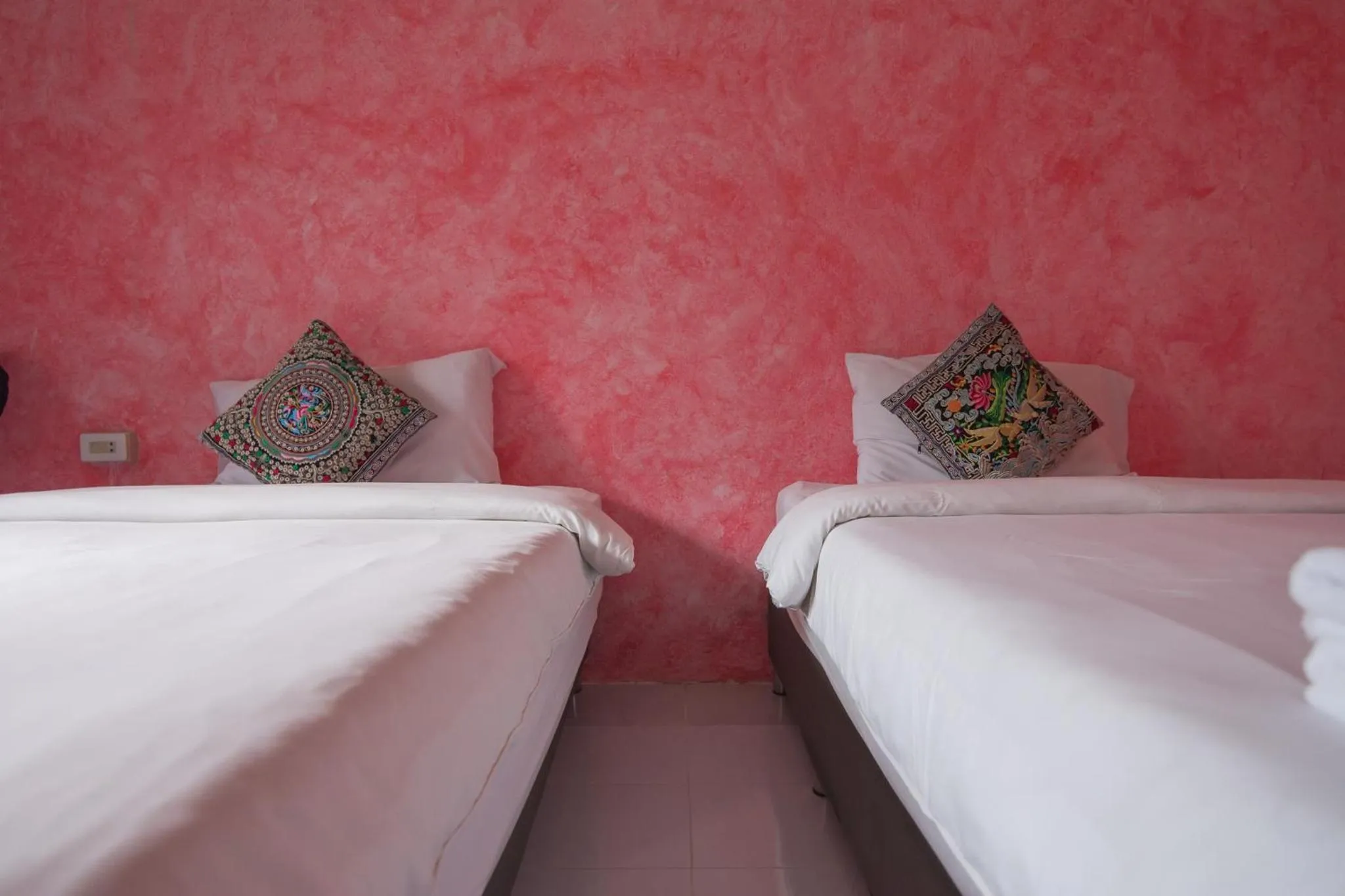 Bed in THANSILA Resort