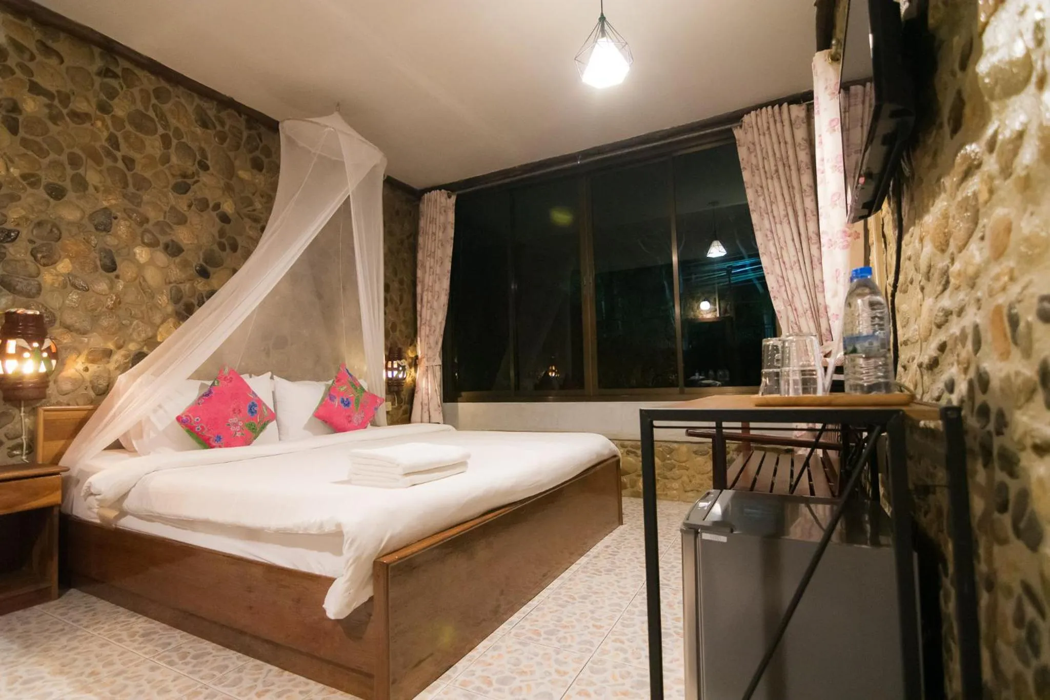 Bed in THANSILA Resort