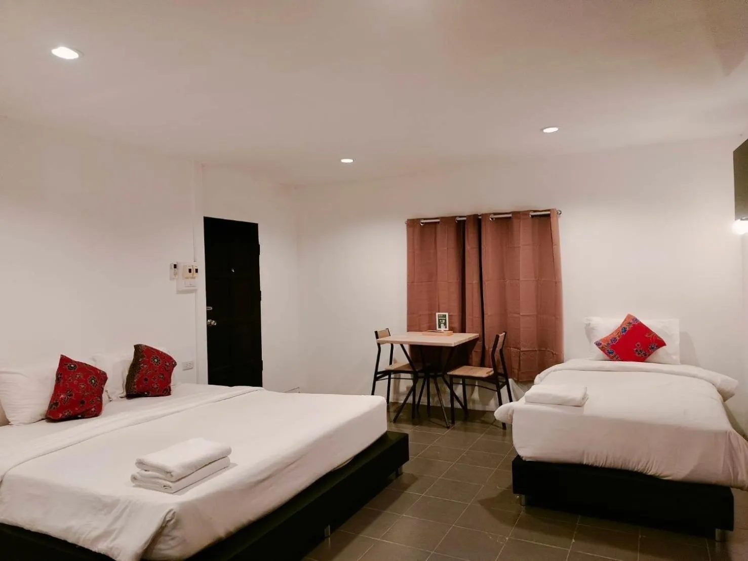 Bed in THANSILA Resort