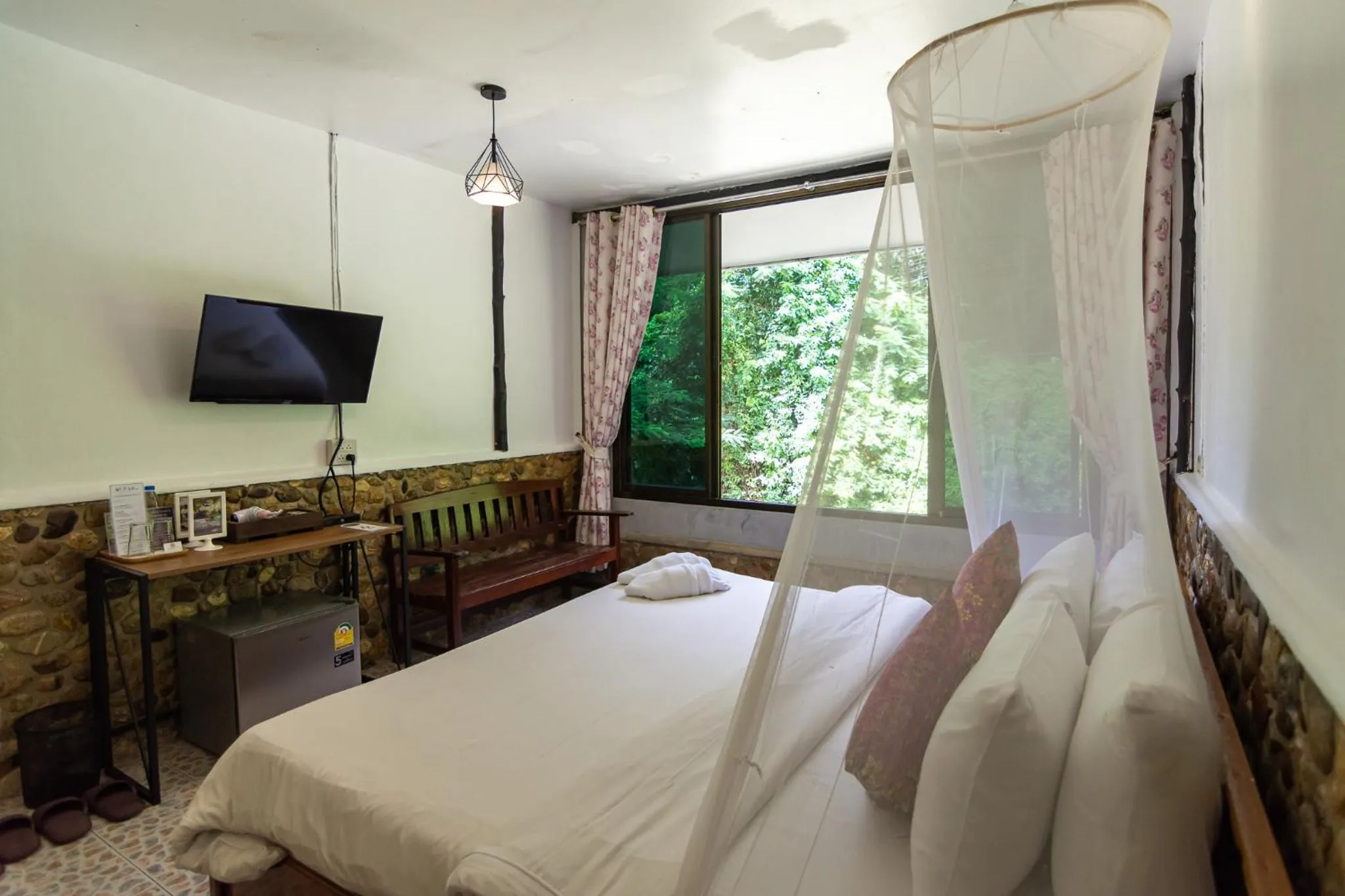 Bed in THANSILA Resort