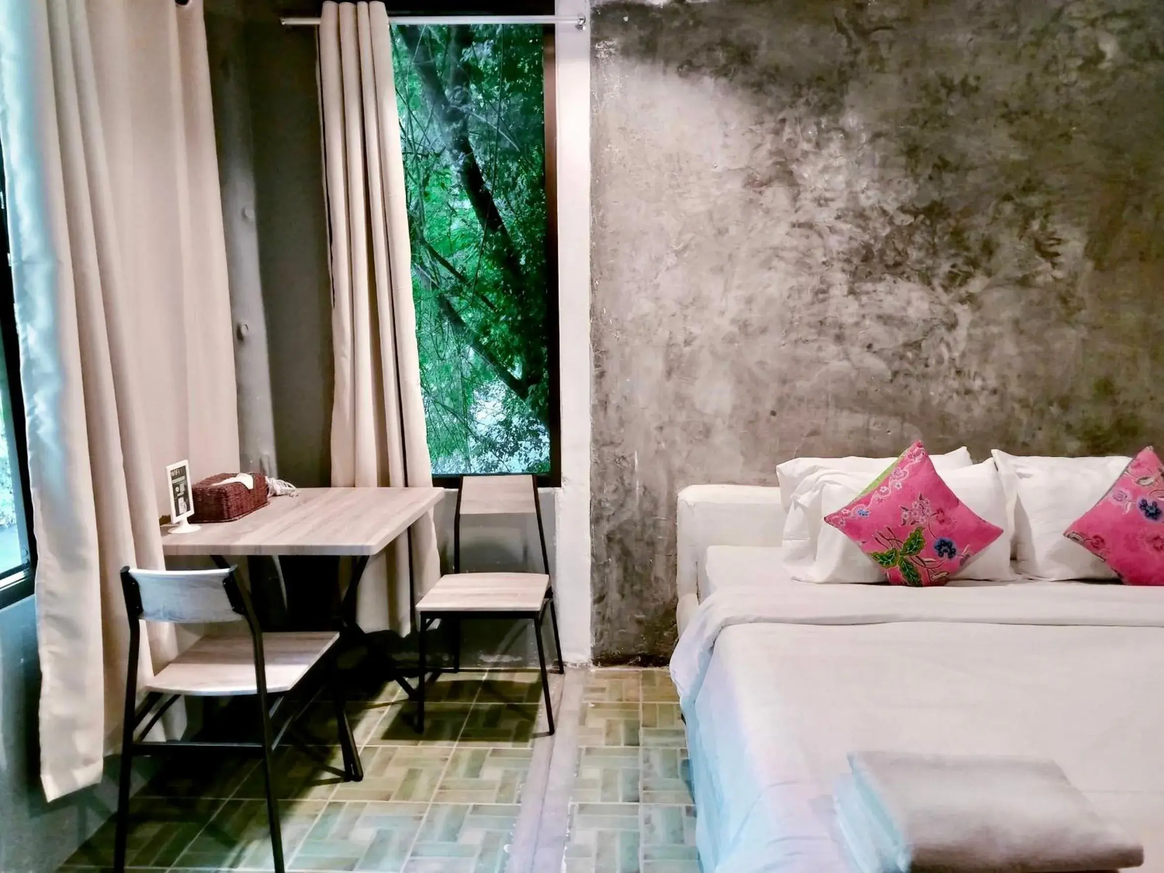 Seating area, Bed in THANSILA Resort Seating area, Bed in THANSILA Resort