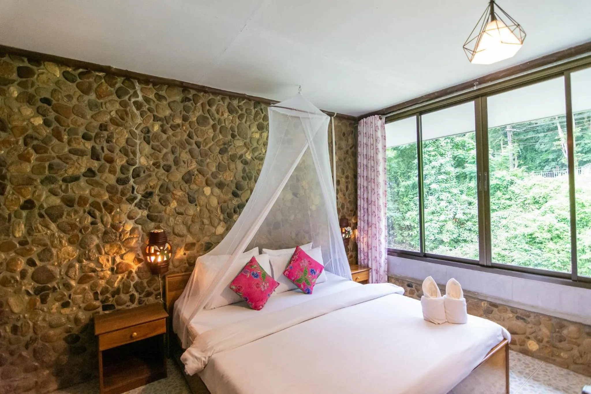 Bed in THANSILA Resort