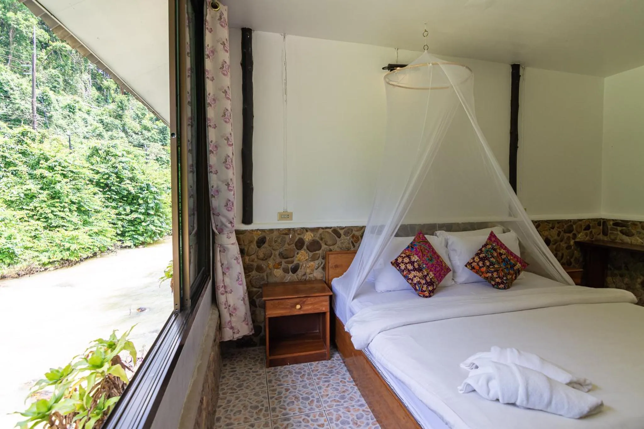 Bed in THANSILA Resort