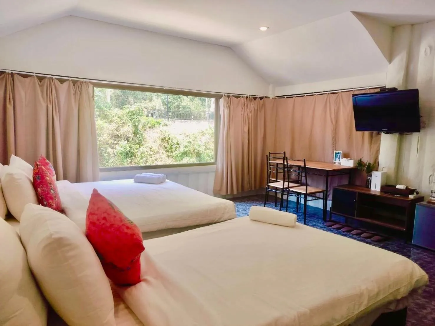 Bed in THANSILA Resort