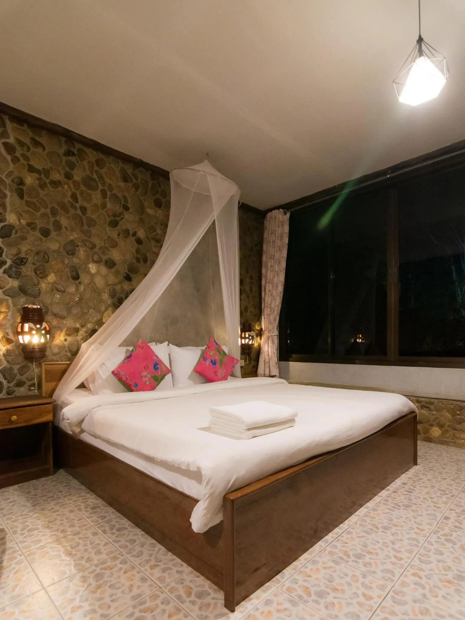 Bed in THANSILA Resort