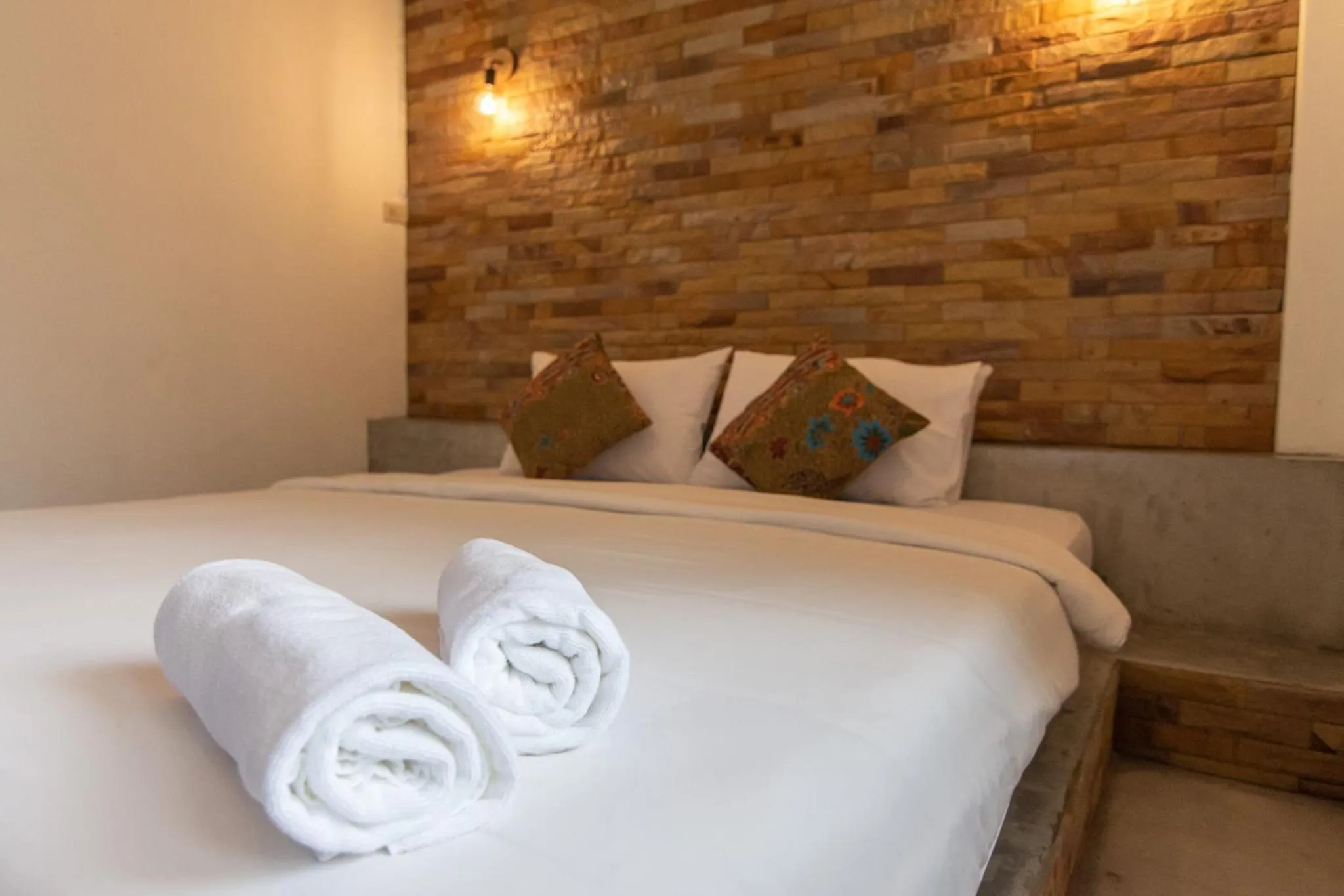 Bed in THANSILA Resort