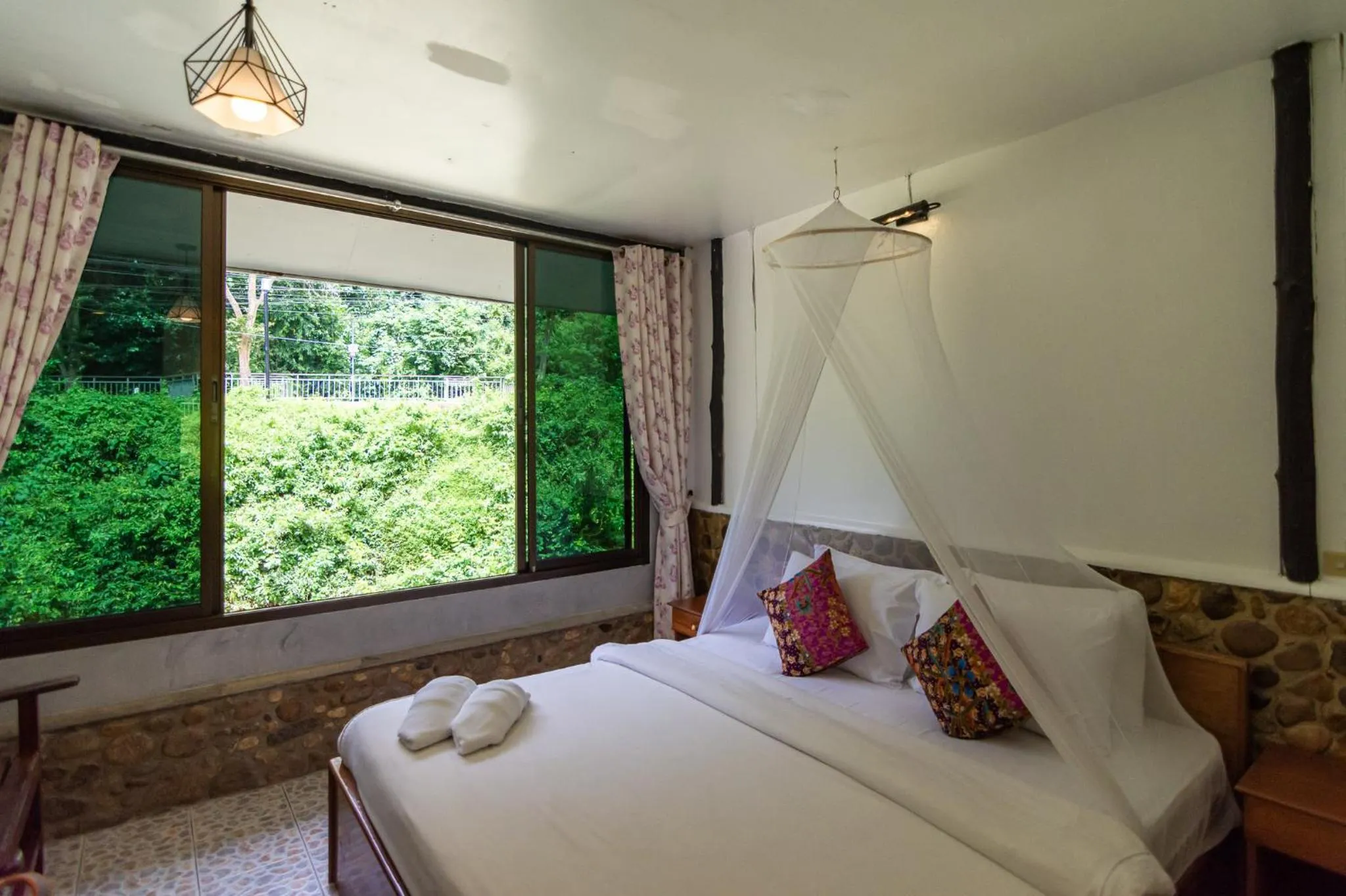 Bed in THANSILA Resort