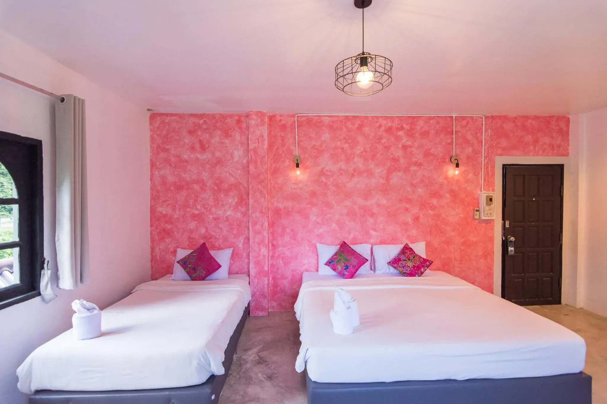 Bed in THANSILA Resort Bed in THANSILA Resort