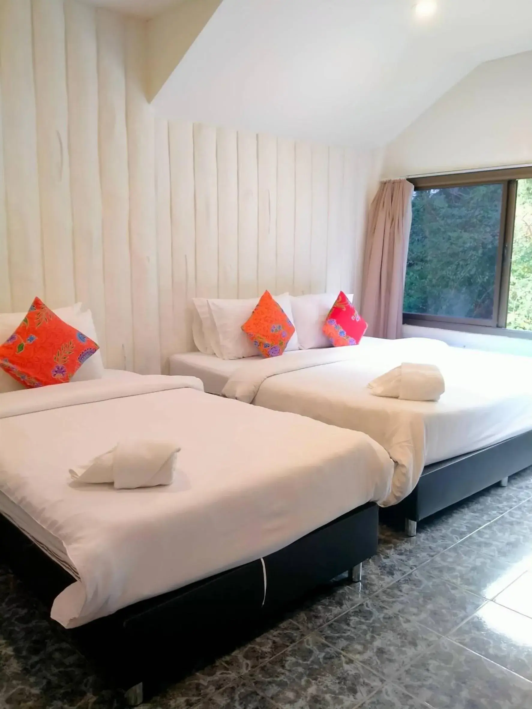 Bed in THANSILA Resort Bed in THANSILA Resort