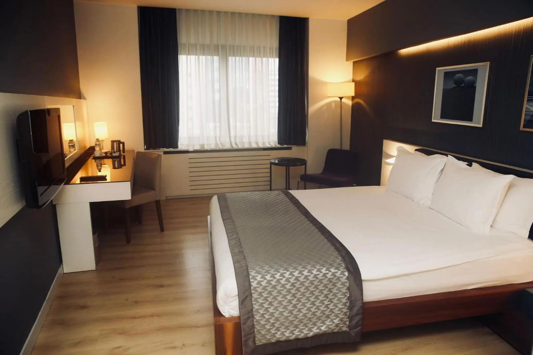 Bed in Surmeli Istanbul Hotel