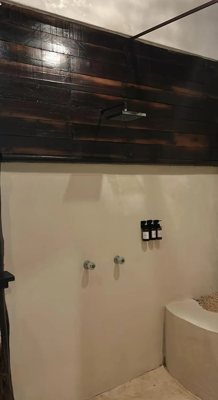 Shower in Alquimia Hotel Boutique