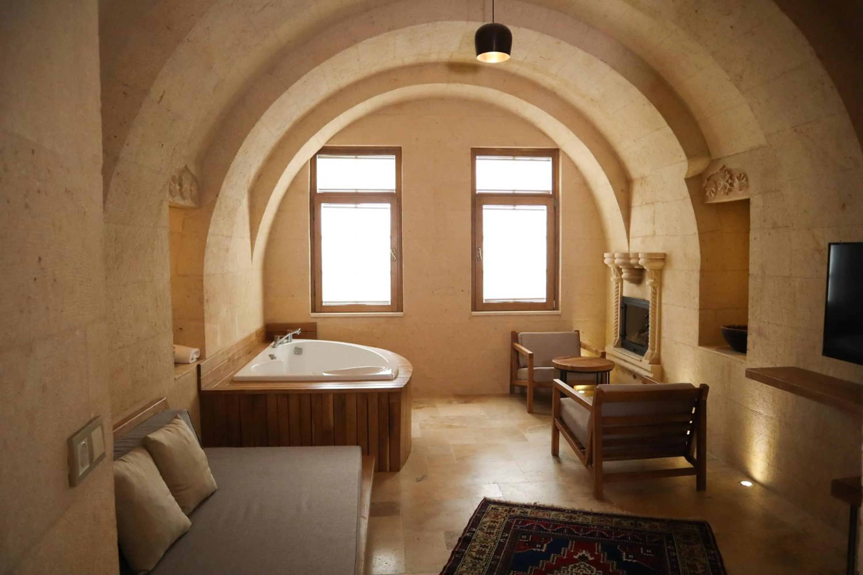 Living room, Bed in Kappadoks Cave Hotel