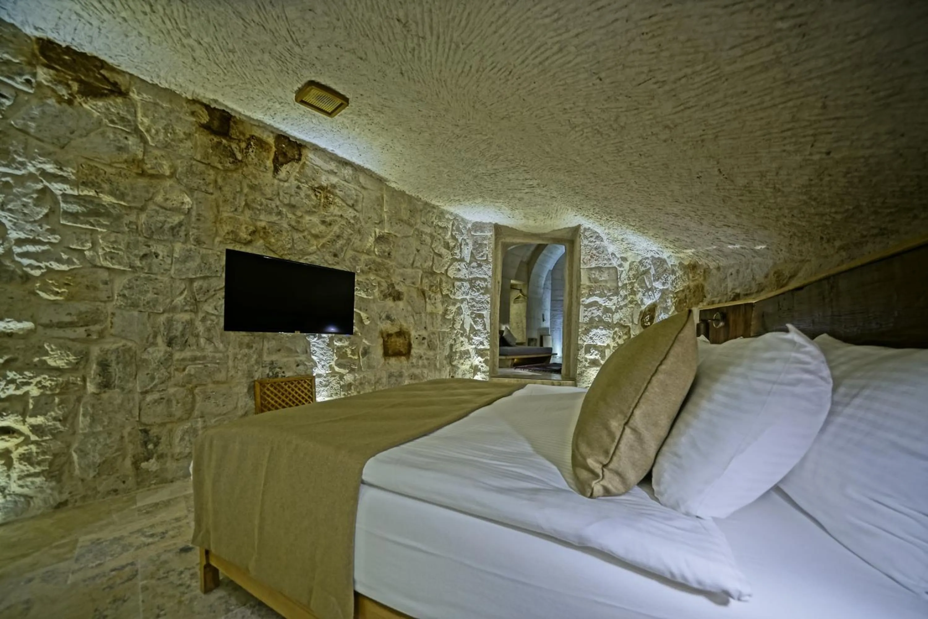 Bed in Kappadoks Cave Hotel