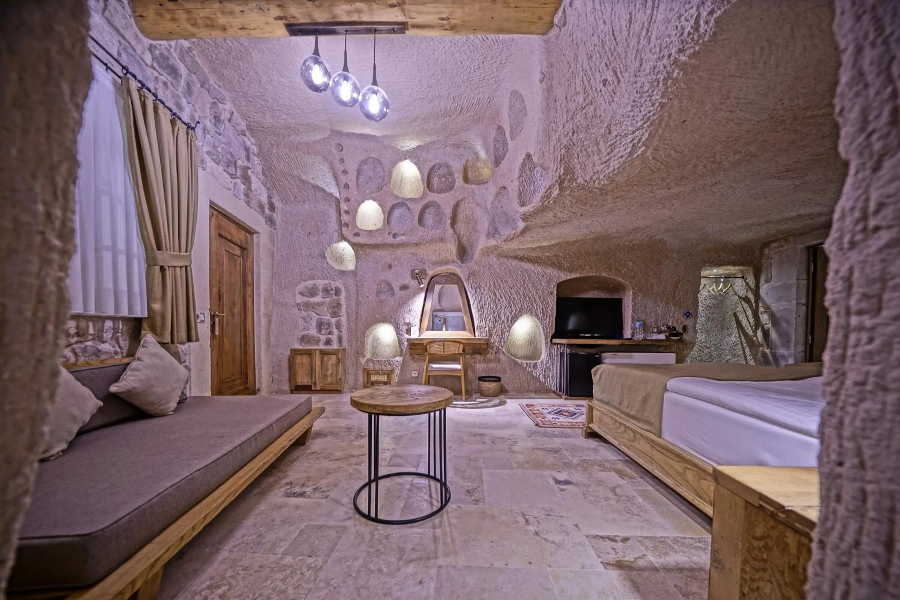 Seating area, Bed in Kappadoks Cave Hotel