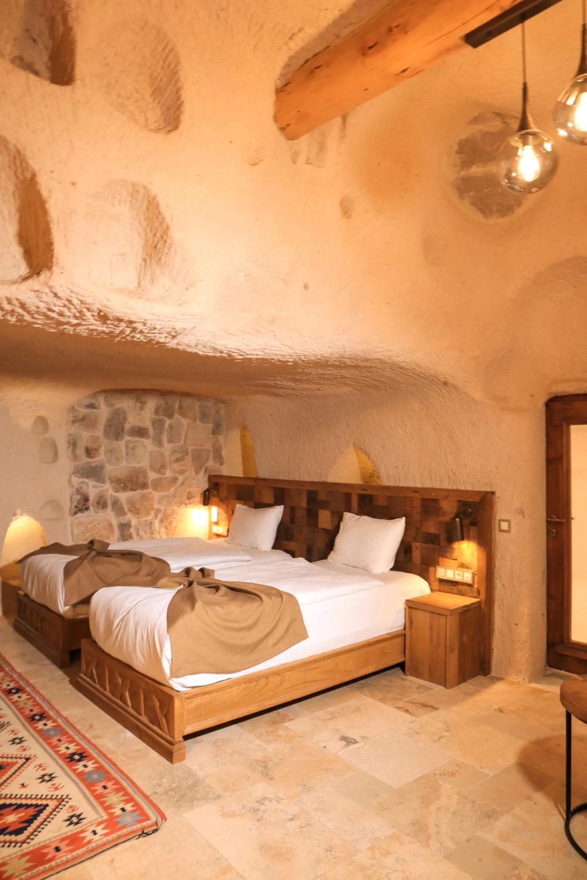 Bed in Kappadoks Cave Hotel