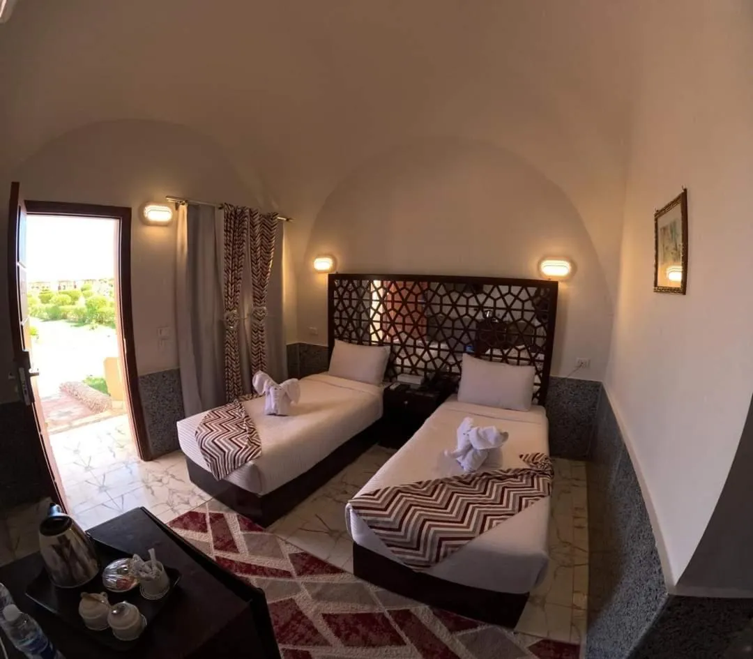 Bedroom, Bed in Dolphin Continental Hotel