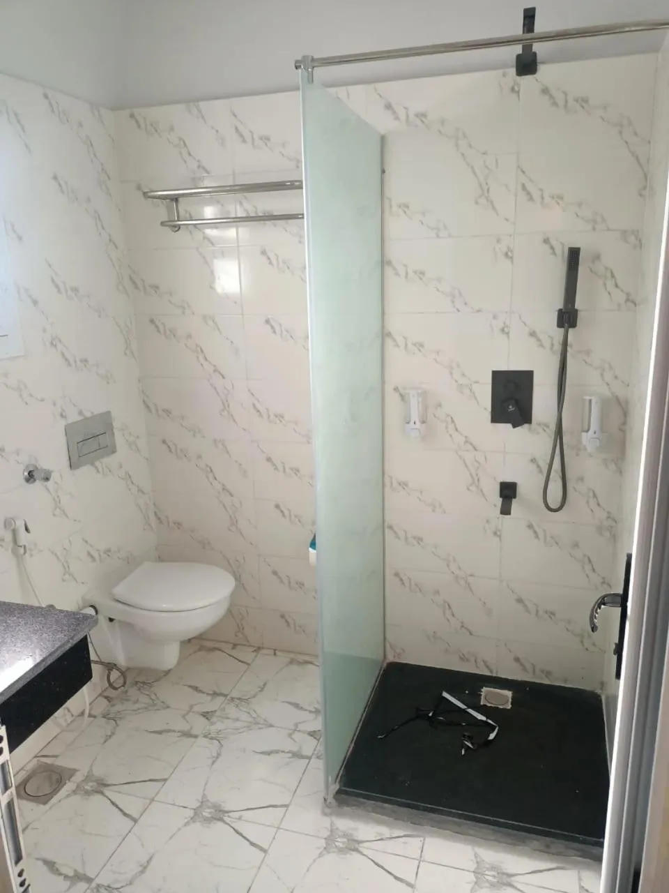 Shower in Dolphin Continental Hotel