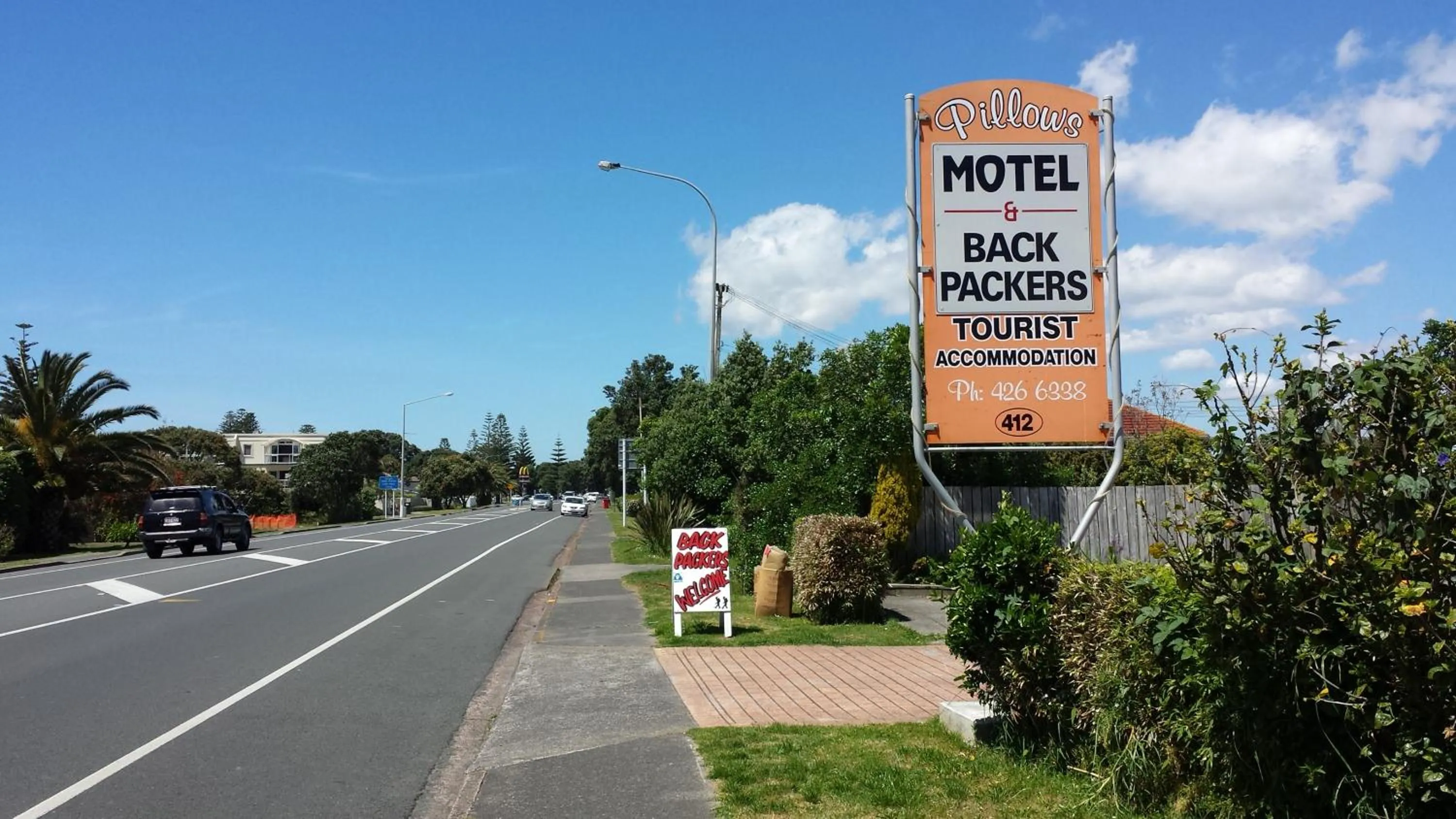 Property logo or sign in Orewa Pillows Lodge