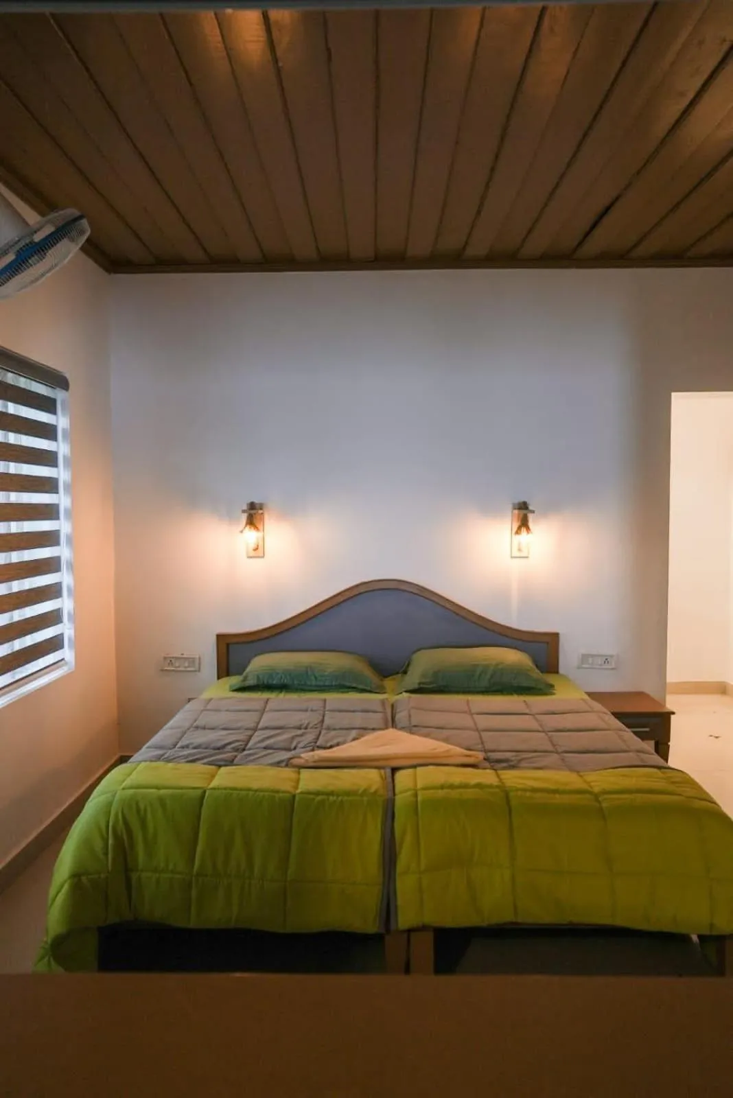 Bed in The Nirvana Resort Munnar