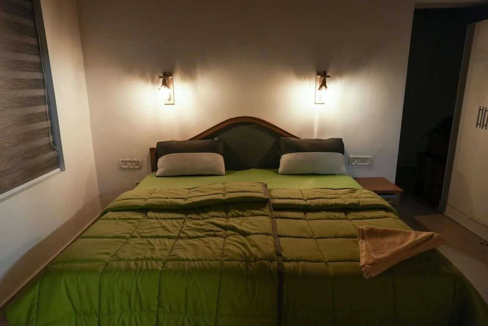 Bed in The Nirvana Resort Munnar